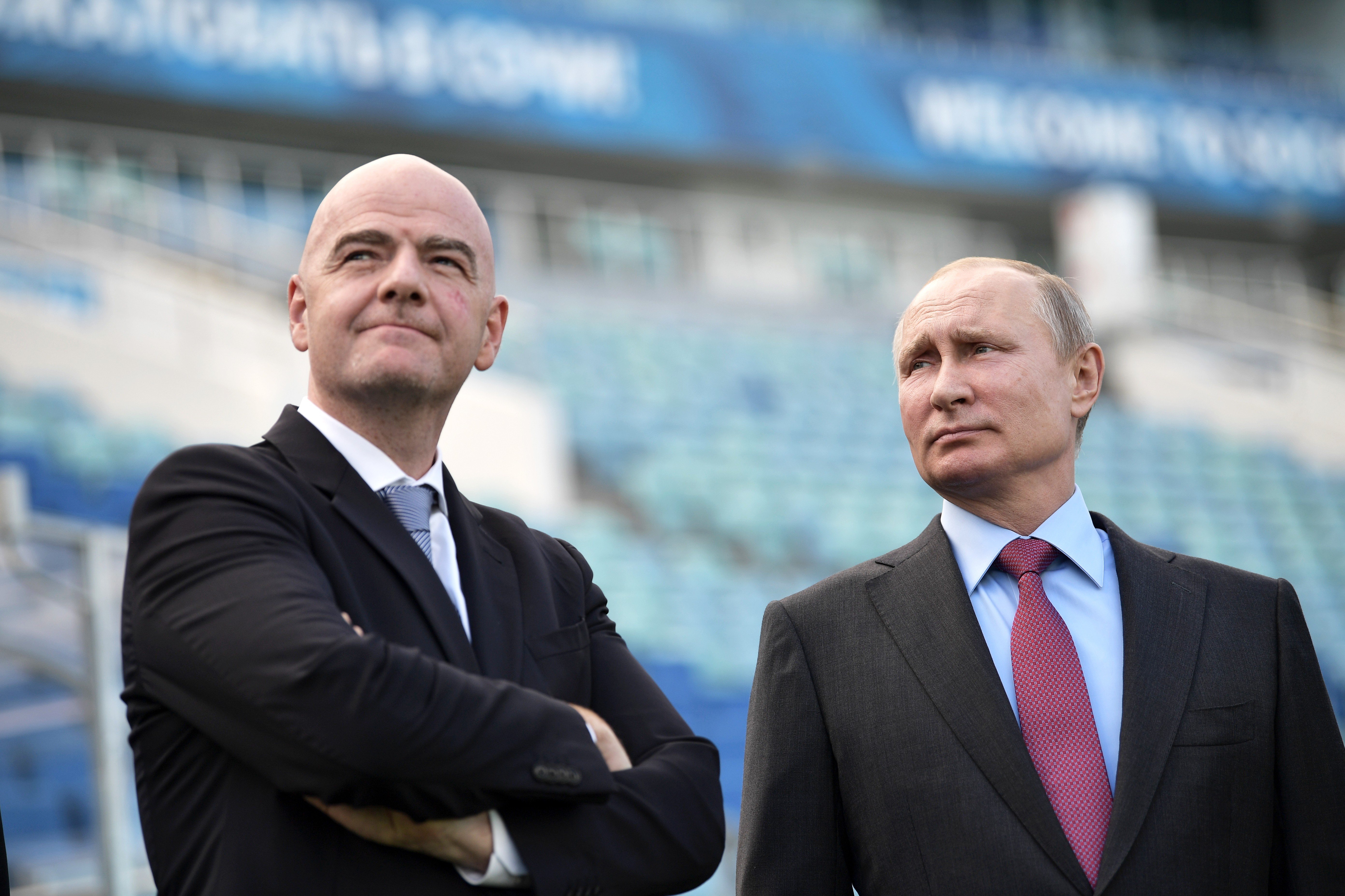 Fifa president Gianni Infantino (left) and Russian President Vladimir Putin inspect the renovated Fisht Stadium, in Sochi, which will host some matches of the upcoming 2018 Fifa World Cup in Russia, on May 3. Infantino has spoken of grandiose plans for world football, including a new world cup for clubs rather than countries. Photo: EPA-EFE 