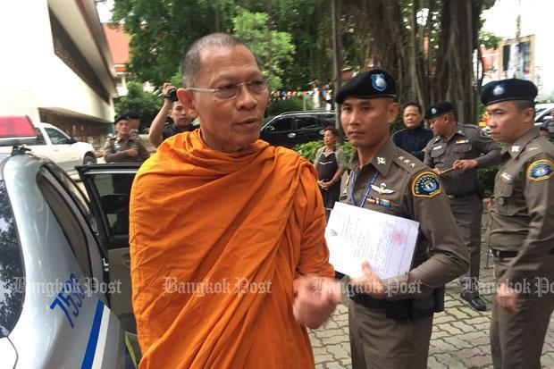 Phra Phrom Dilok, a member of the Sangha Supreme Council and abbot of Wat Sam Phraya, is arrested at his temple in Phra Nakhon district, Bangkok. Photo: Bangkok Post