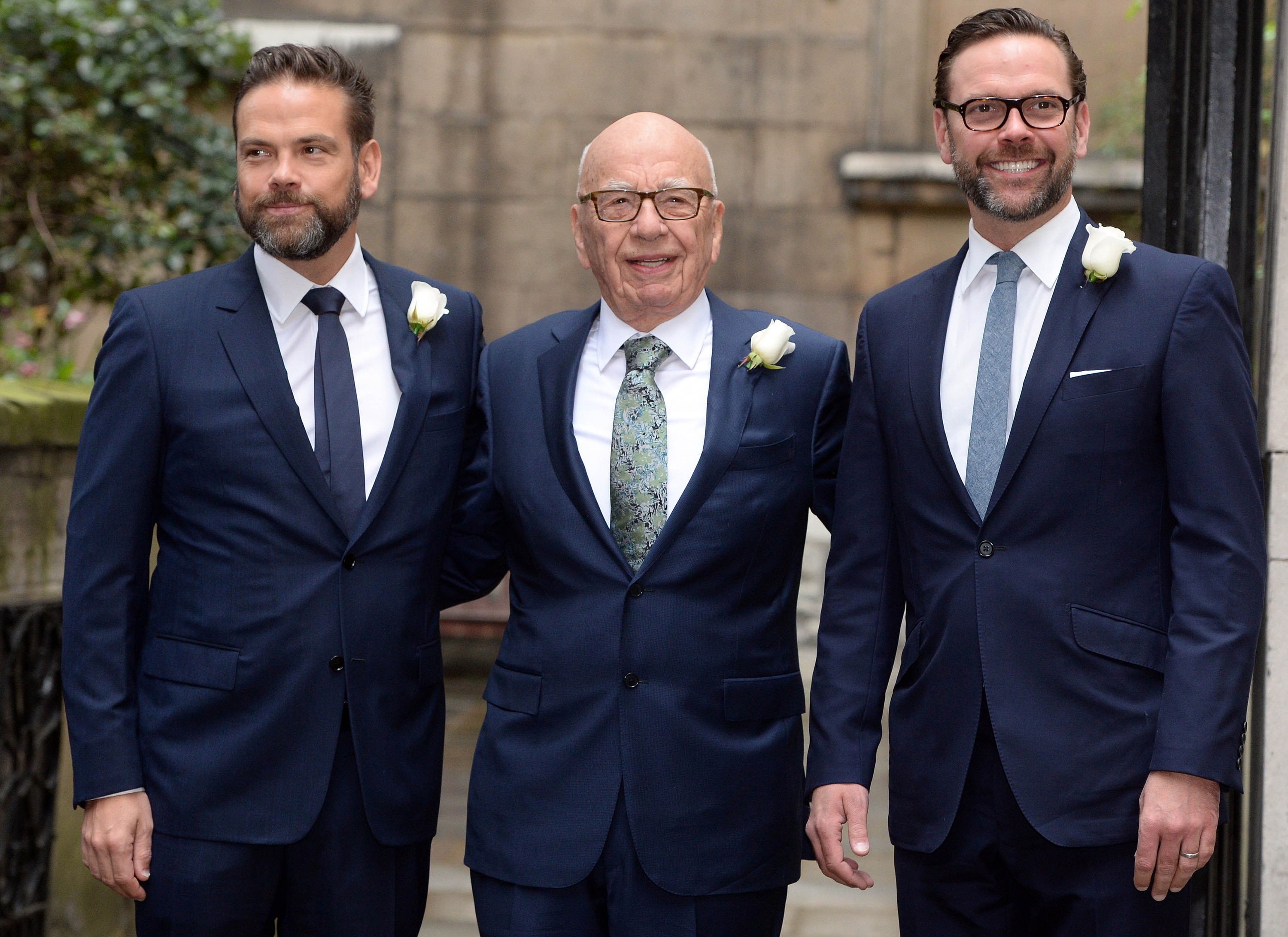 Fox CEO James Murdoch, right, with his father Rupert and brother Lachlan in 2016. James has not been shy about expressing his support for Disney over Comcast. Photo: i-Images/Zuma Press/TNS