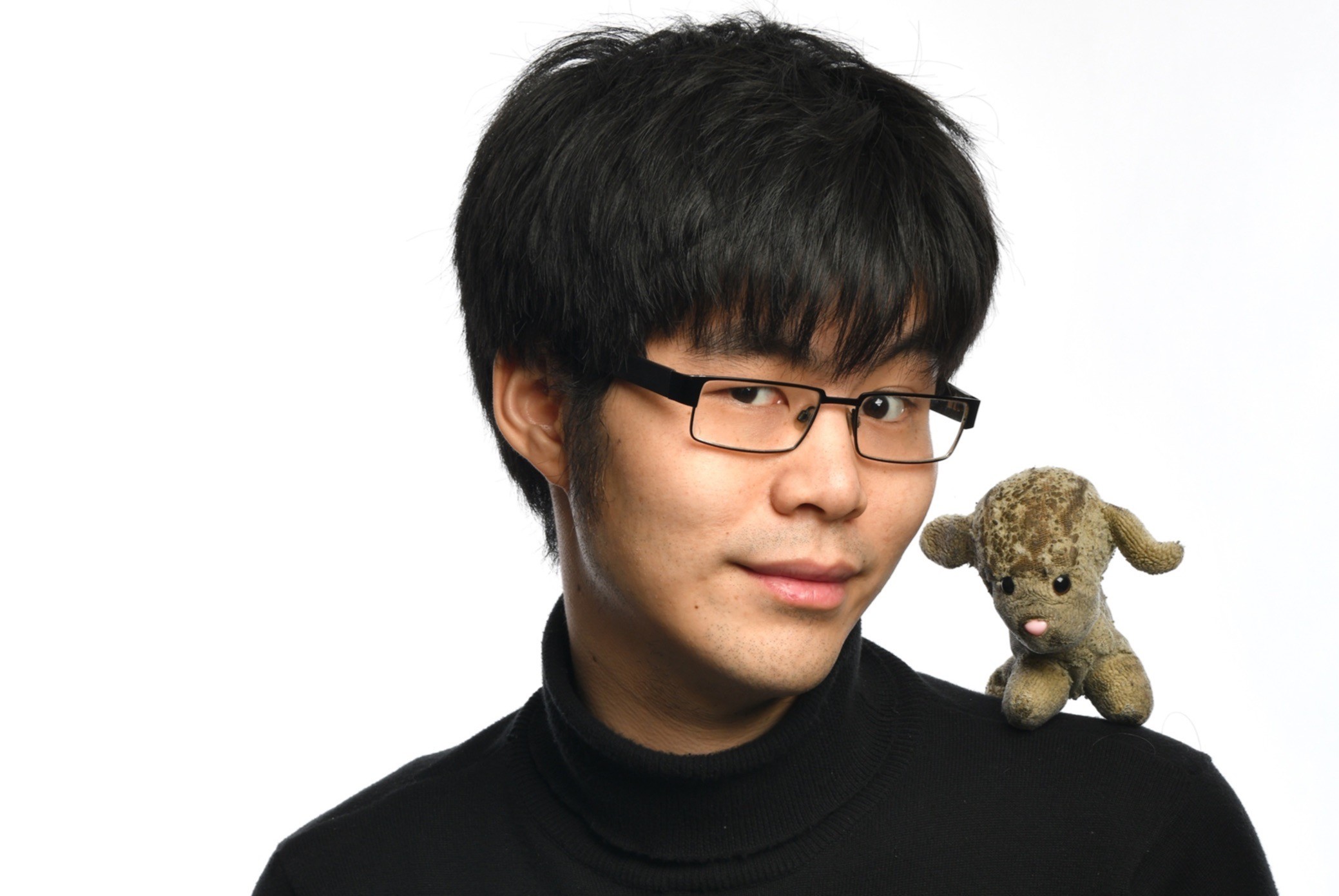 Ken Cheng with one of his toy lambs. Picture: courtesy of Ken Cheng