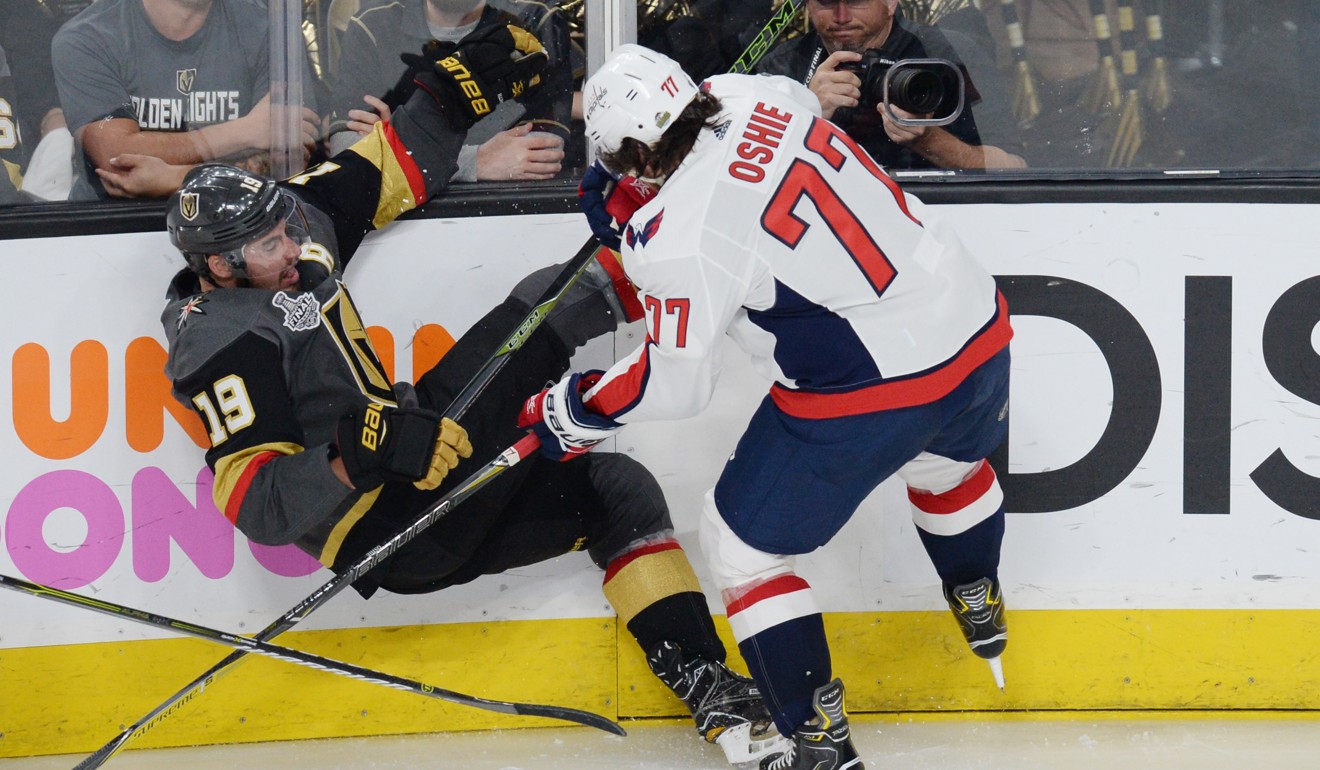 Reilly Smith places his baby inside Stanley Cup after Knights' victory