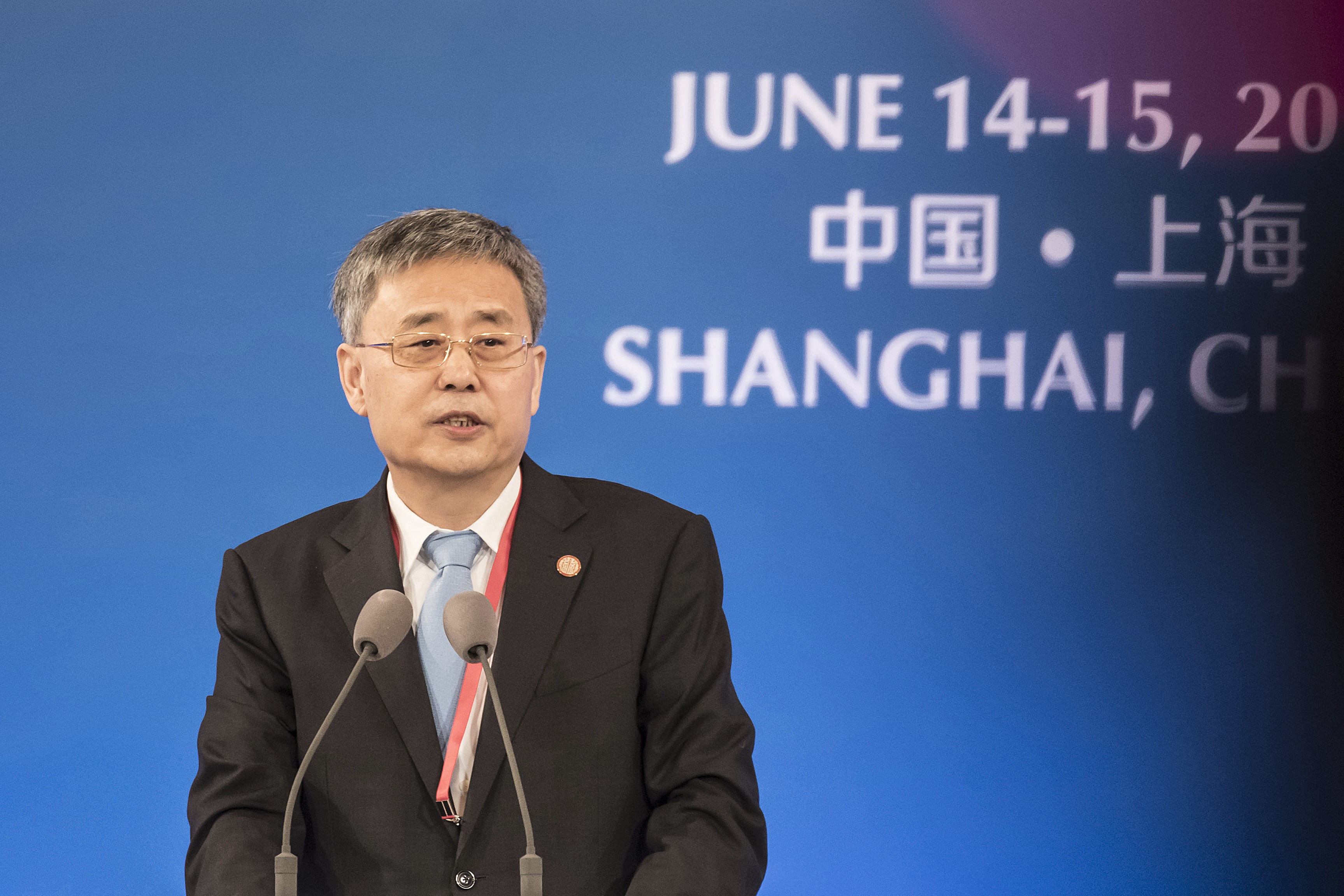 Guo Shuqing, chairman of the China Banking Regulatory Commission, speaks during the Lujiazui forum in Shanghai, on Thursday. Photo: Bloomberg