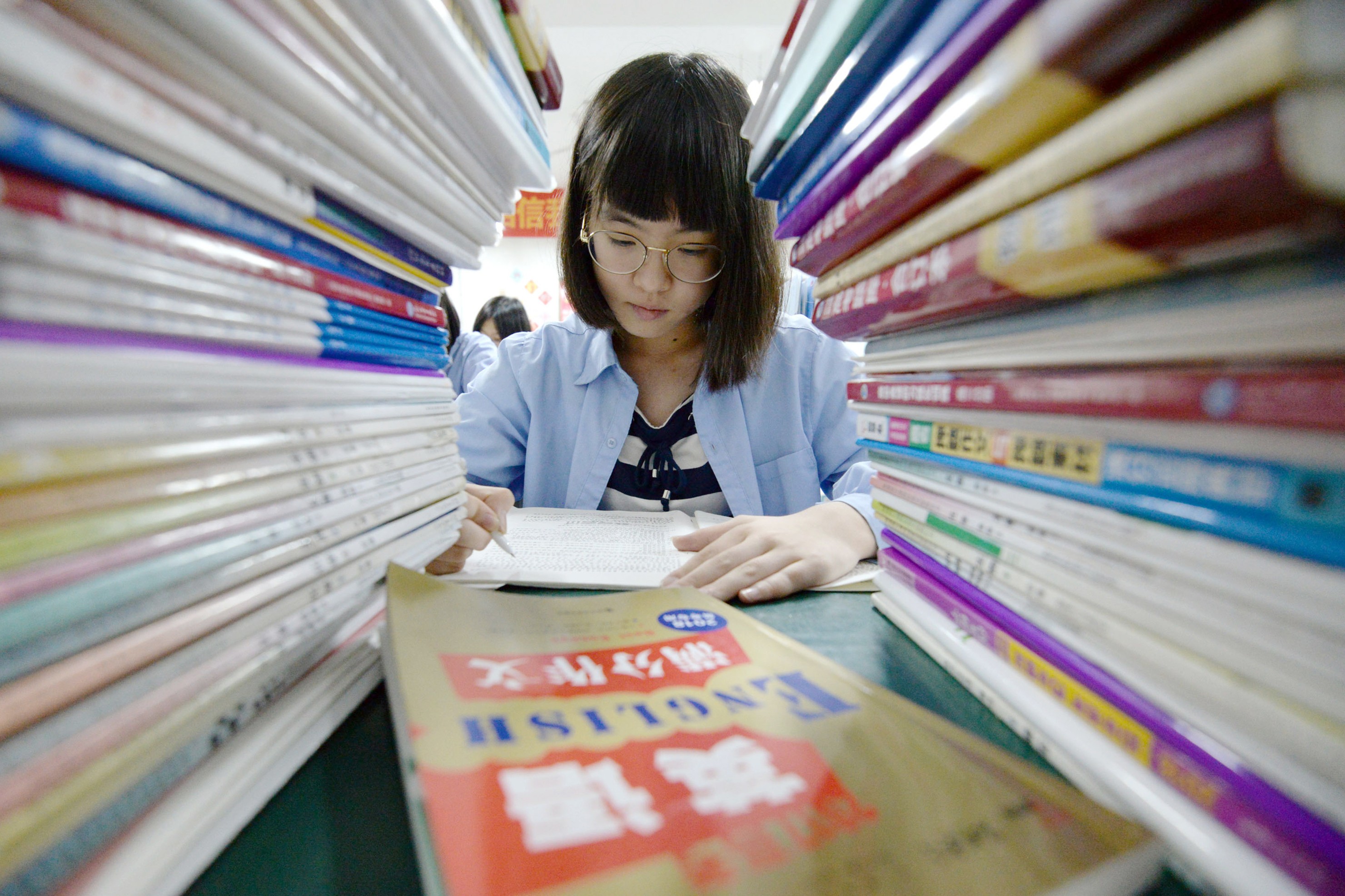 A high school student prepares for the annual “Gaokao” or college entrance examinations in China. So far this year, three Chinese after-school education providers have listed in the US. Photo: AFP