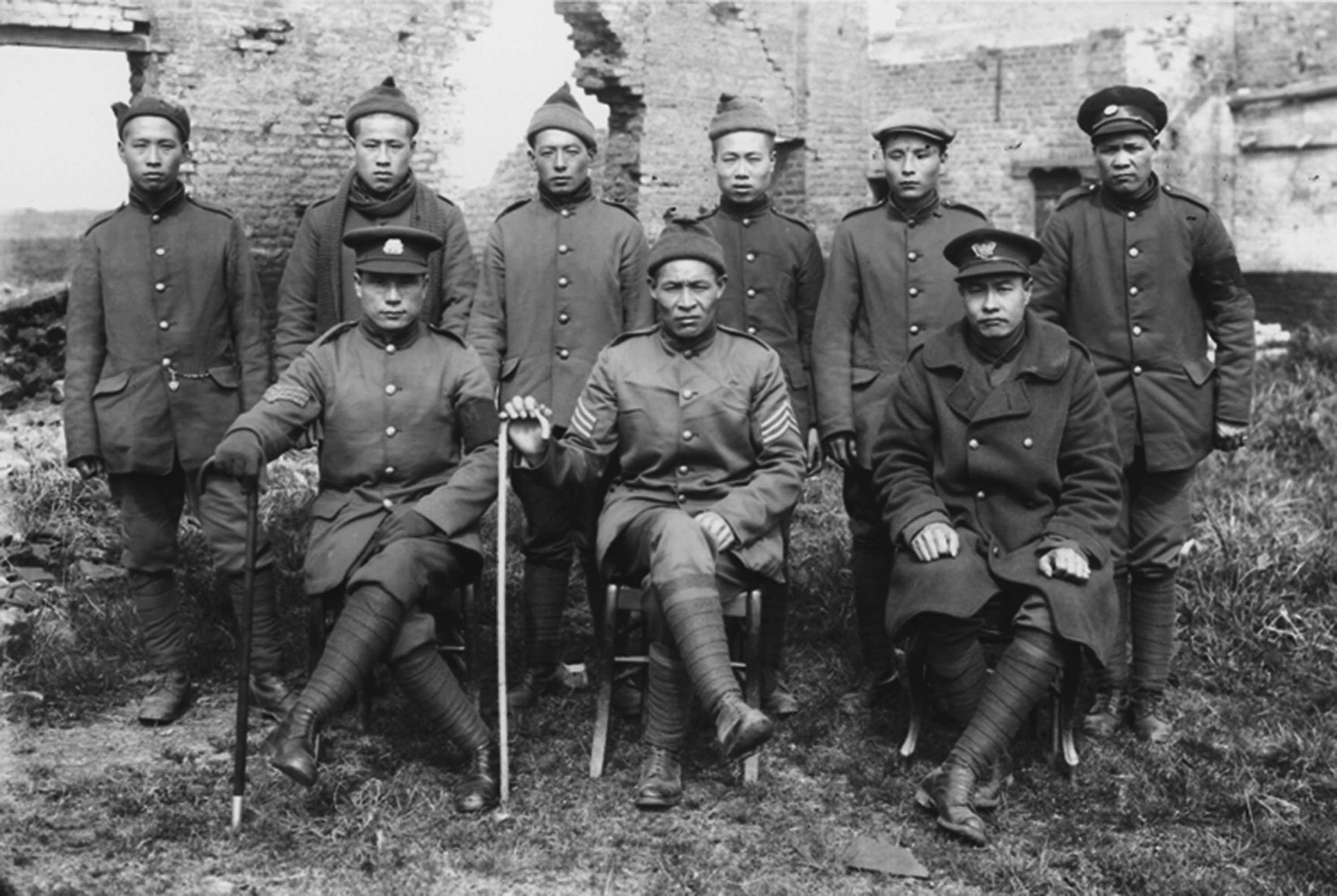 Members of the Chinese Labour Corps, in a ruined house. It is believed that about 2,000 died of them during the conflict. Photo: In Flanders Fields Museum, Ypres