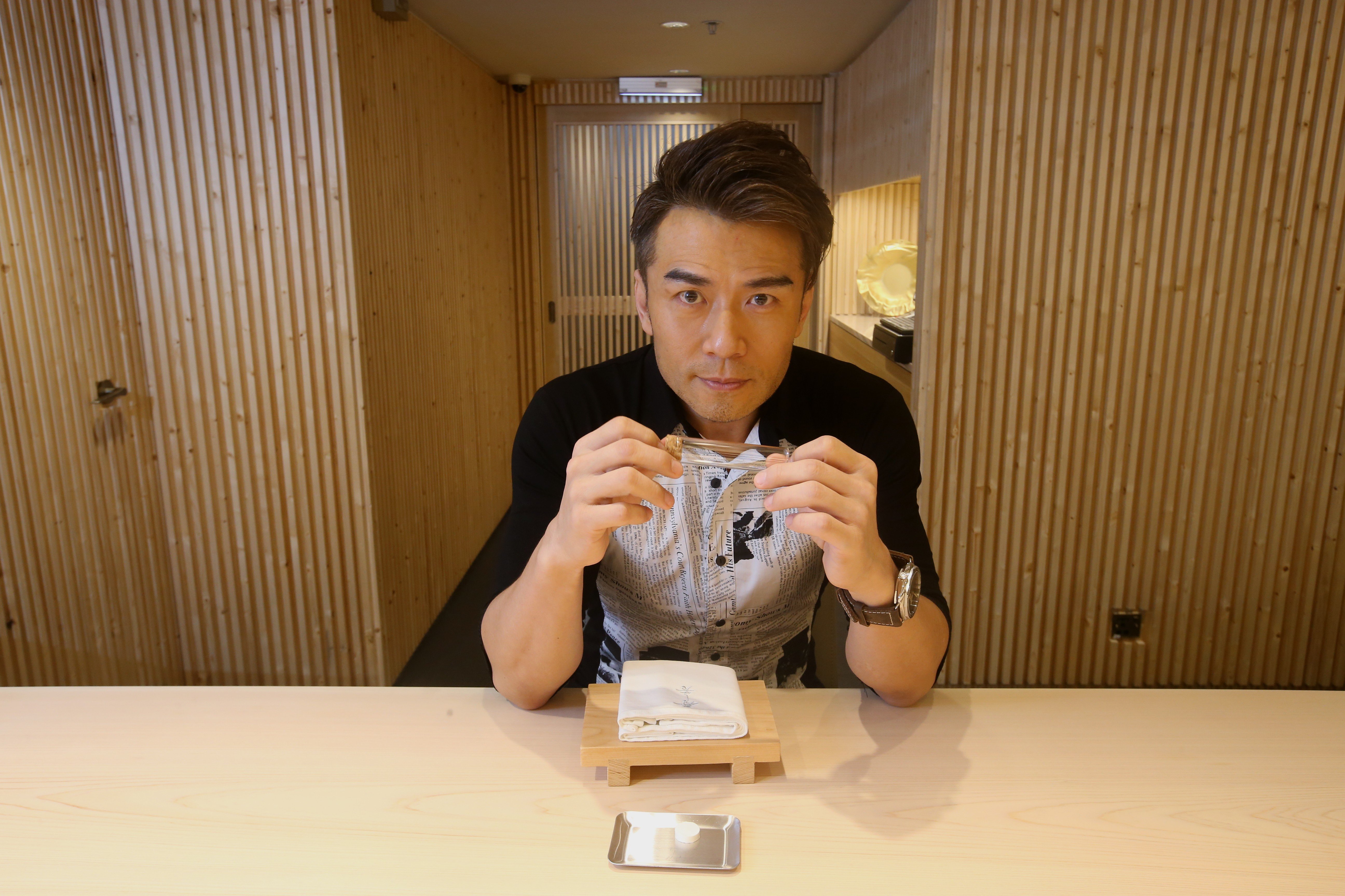 Actor Michael Tong is ready to get down to the business of eating. Photo: David Wong