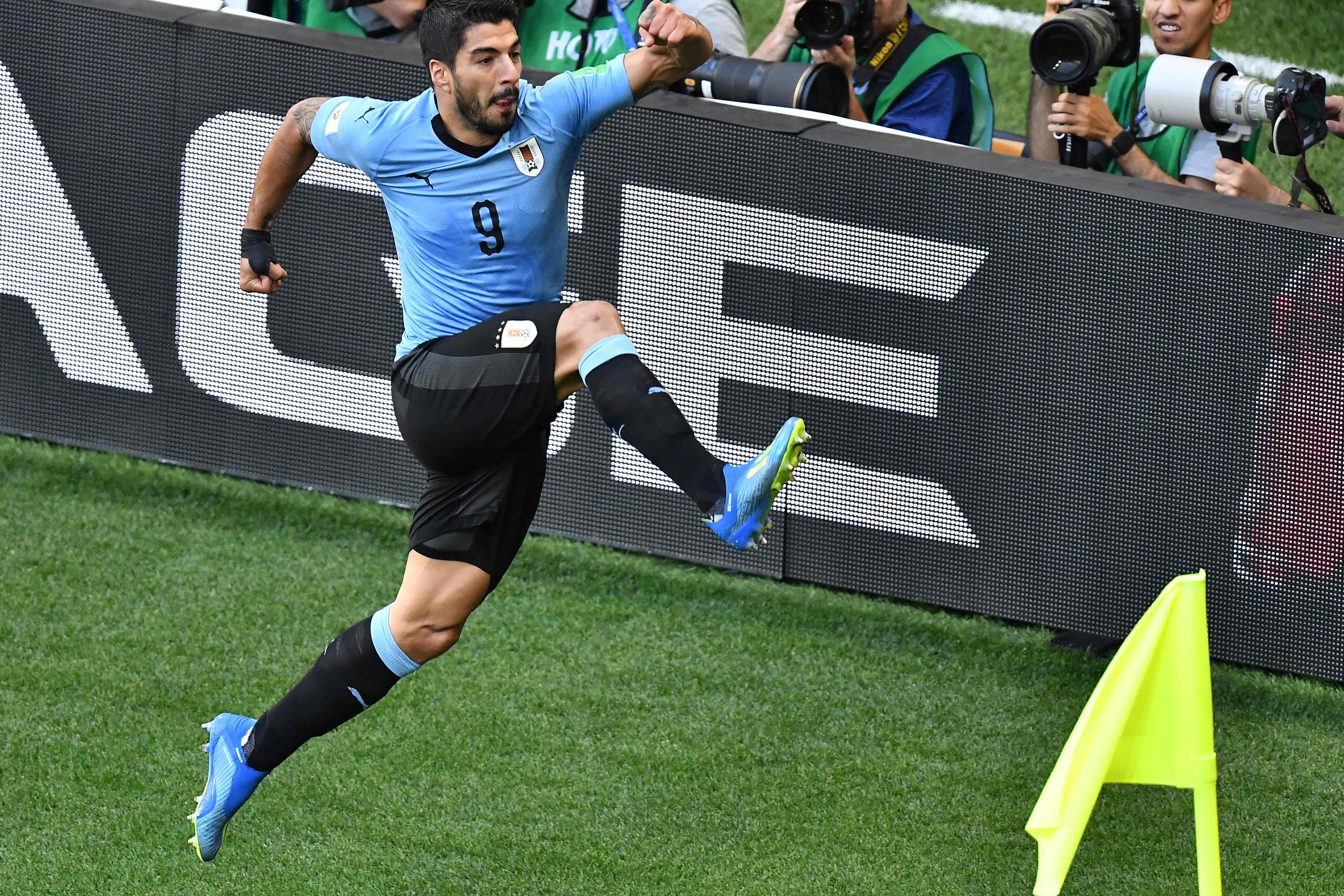 Suarez fires Uruguay past Saudi Arabia into the Round of 16