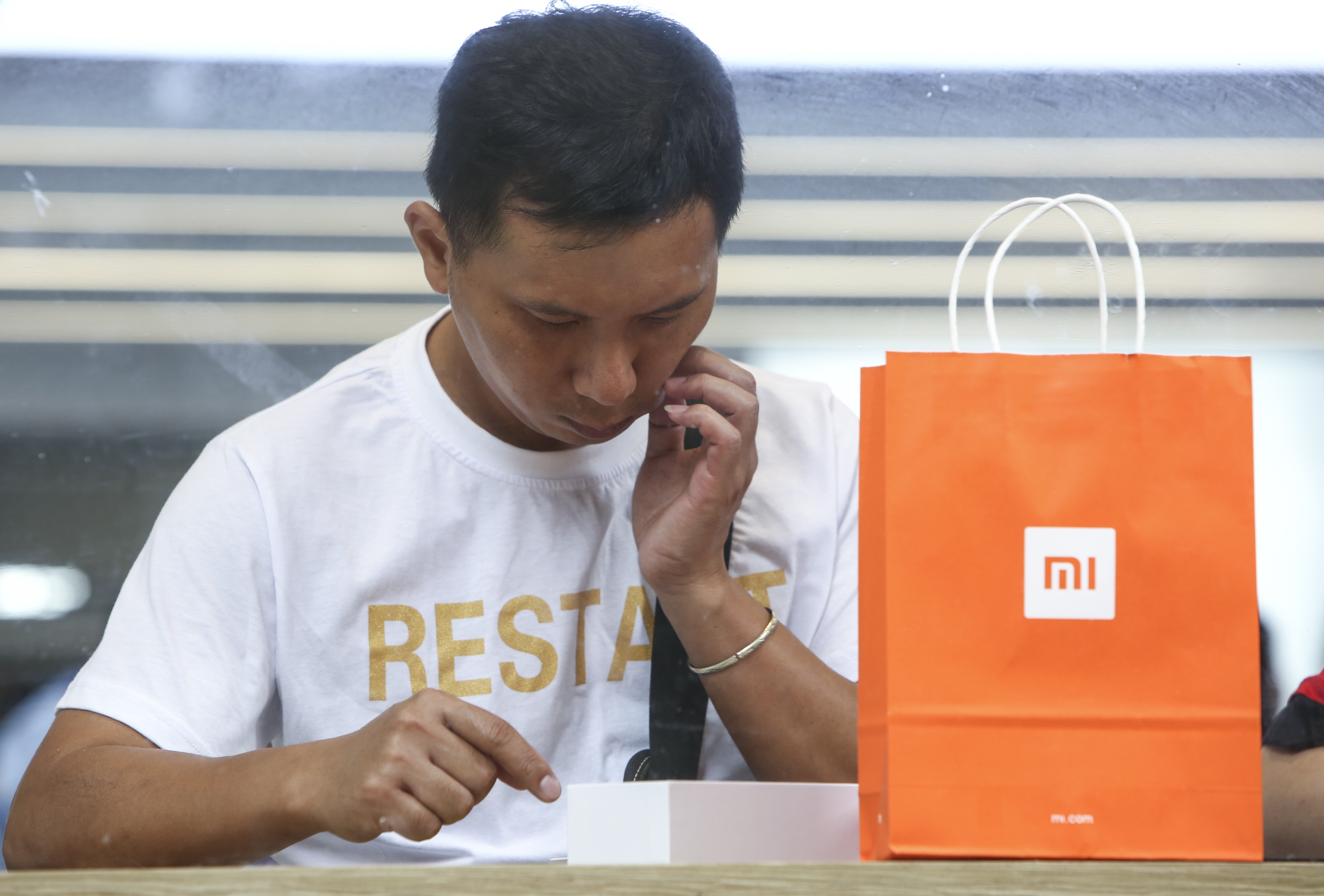 Customers visit to a Xiaomi Store in Mong Kok, Hong Kong on 25 June 2018. Photo: SCMP/Edmond So