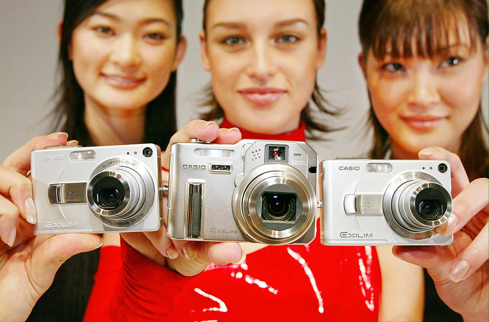 Models display Casio Computers’ Exilim digital cameras. The company, which has diversified into cameras and watches, is synonymous in the popular imagination with calculators. Photo: AFP