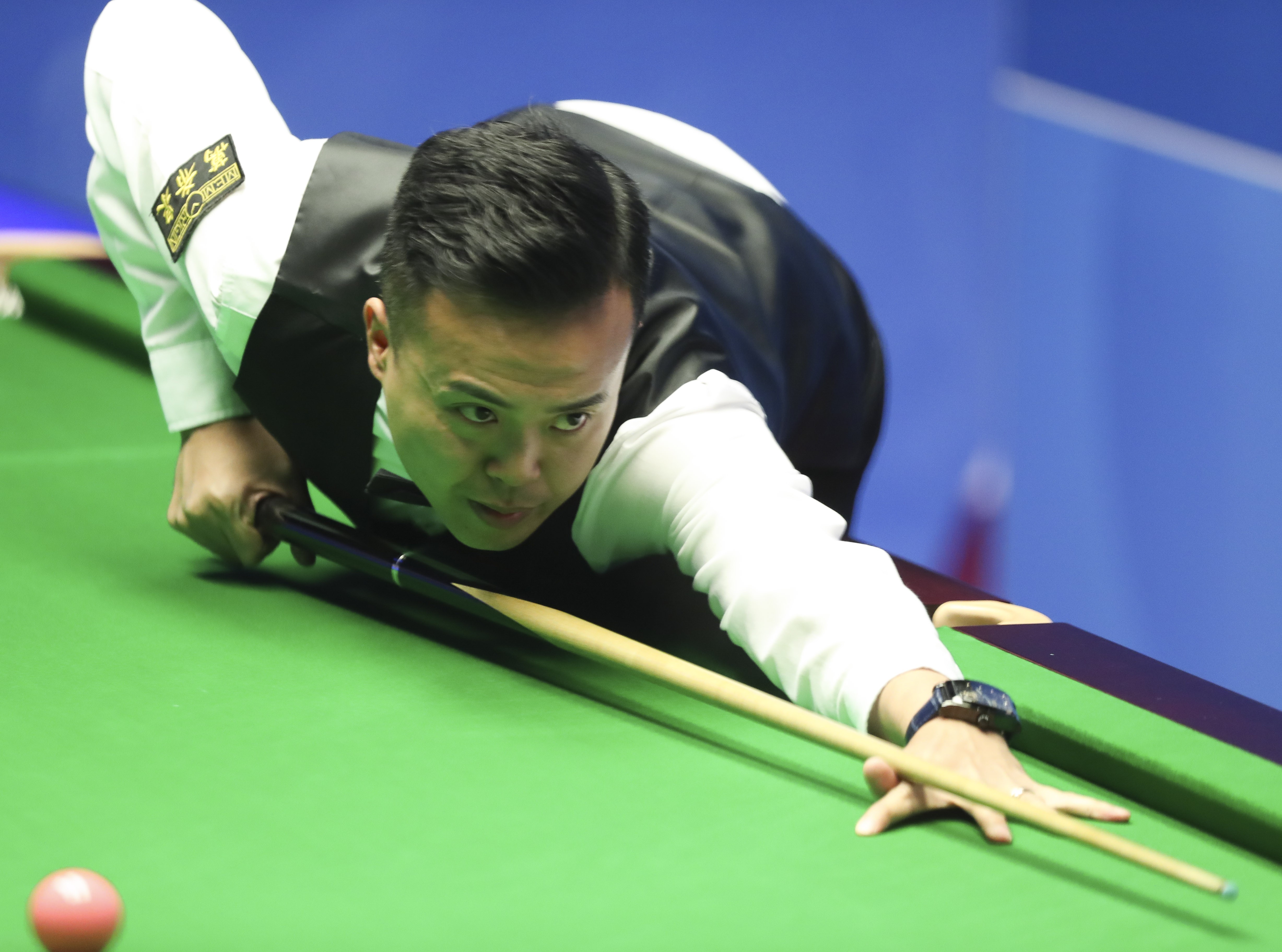 Marco Fu Ka-chun of Hong Kong of China competes during the first round match with Lyu Haotian of China at the World Snooker Championship 2018 at the Crucible Theatre in Sheffield. Photo: Xinhua