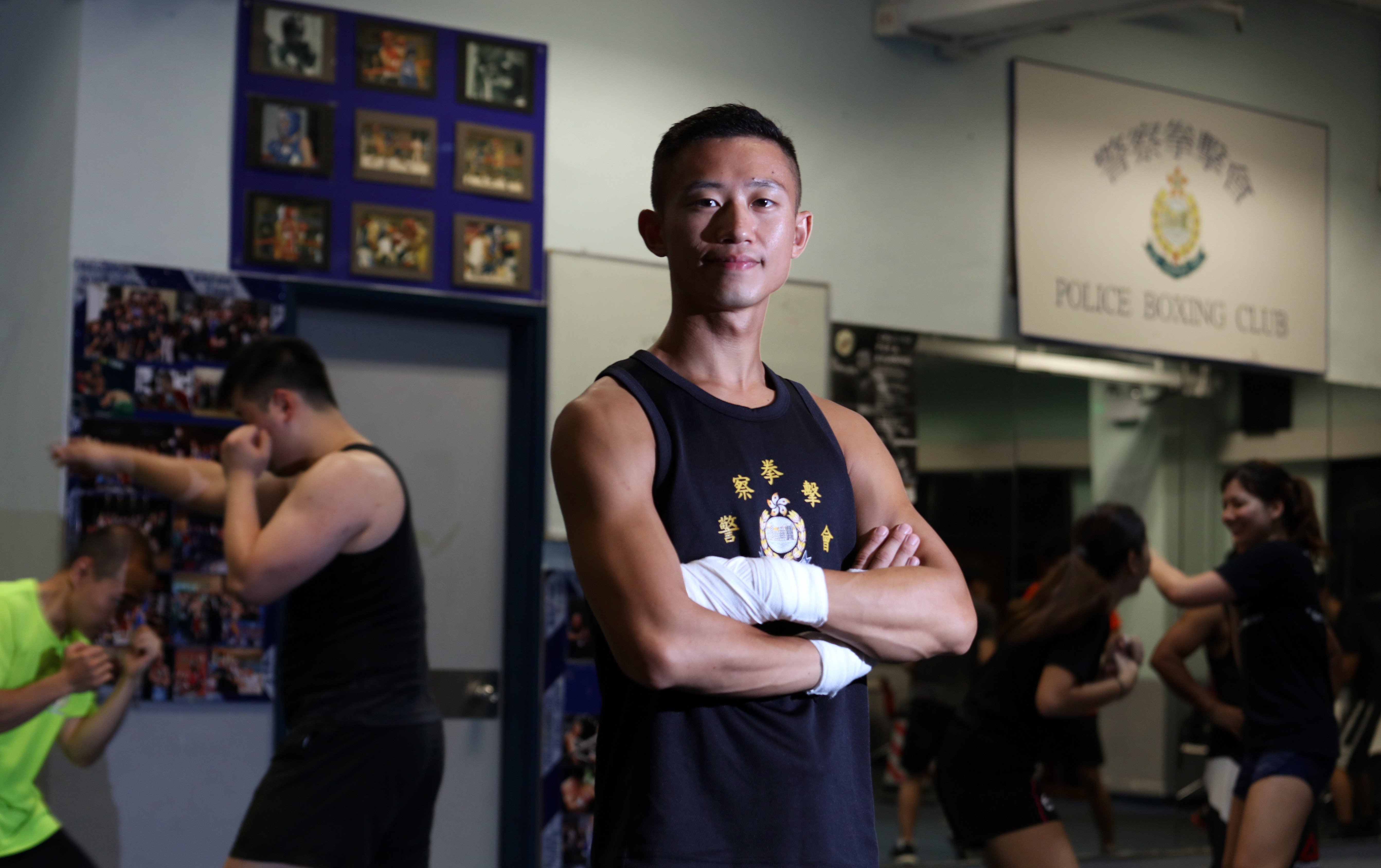 Hong Kong policeman Edwin Ng prepares at the Tai Po Police Boxing Club ahead of his second professional fight. Photo: Felix Wong