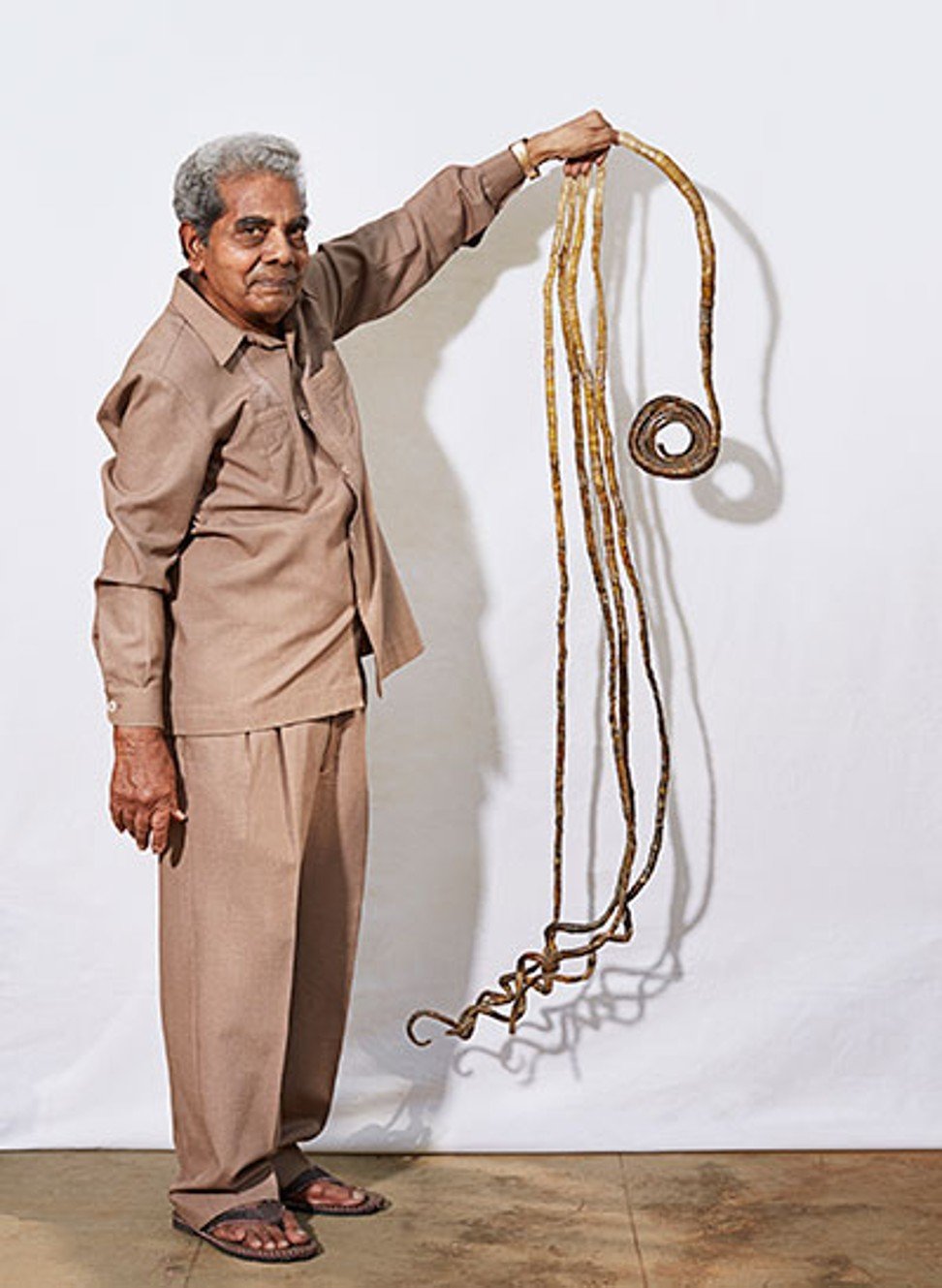 Man with worlds longest nails gets a much needed manicure - Blurred Culture