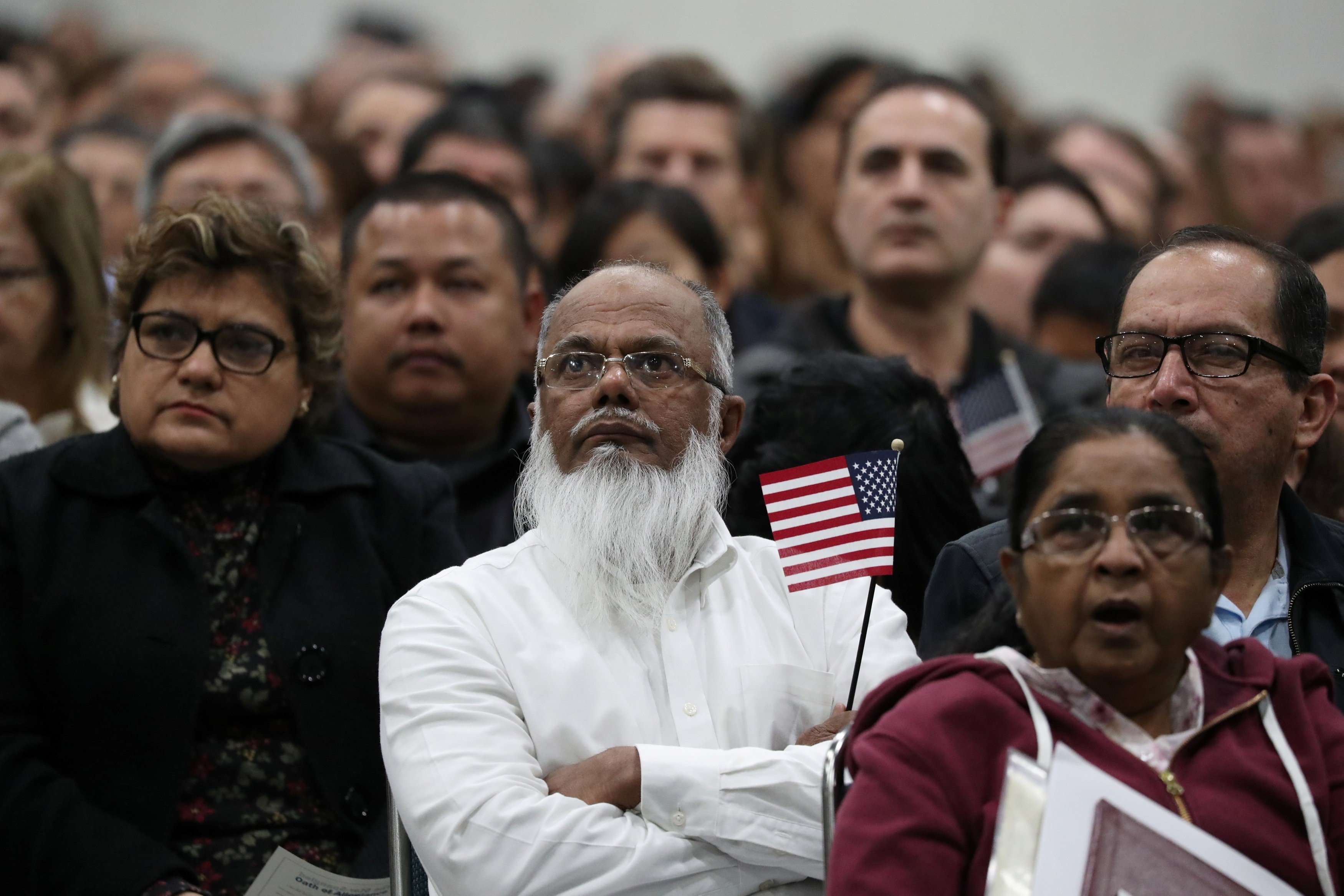 Immigrants participate in a naturalisation ceremony to become new US citizens in Los Angeles on March 20. Photo: Reuters