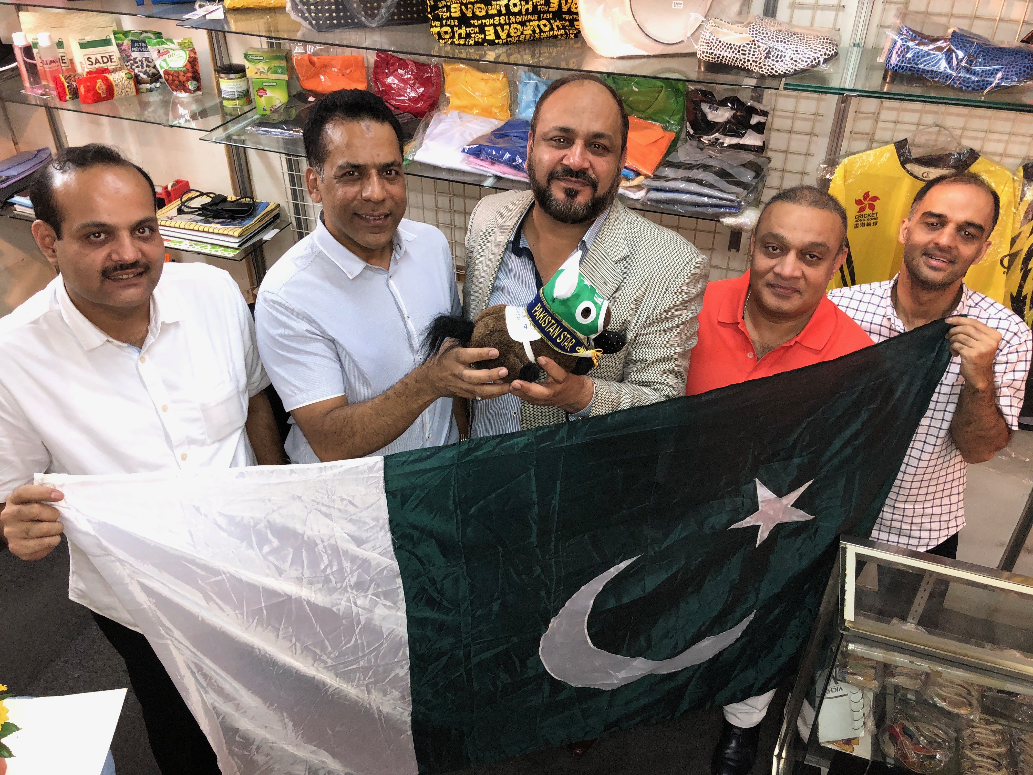 Mohammad Ilyas, Bhatti Saeed, Jawad Ashraf, Mian Rasheed and Shahid Mubeen with a Pakistan Star plushie. Photo: Michael Cox