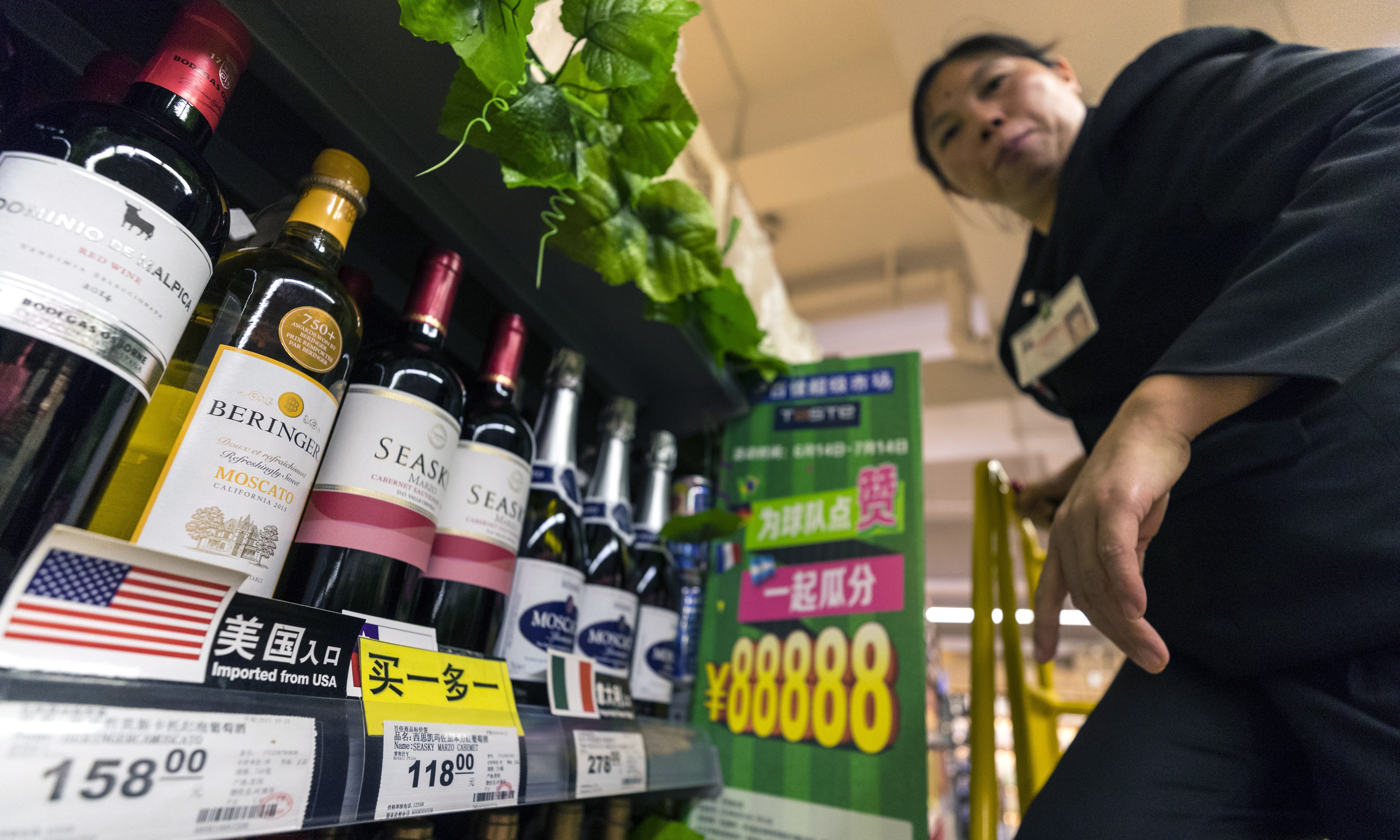 Bottles of wine imported from the US sit on a store shelf in Guangzhou on July 14. Politicians get agitated over the fact that most consumers pay attention only to value for money in making their buying decisions, caring little where the goods come from. Photo: EPA-EFE