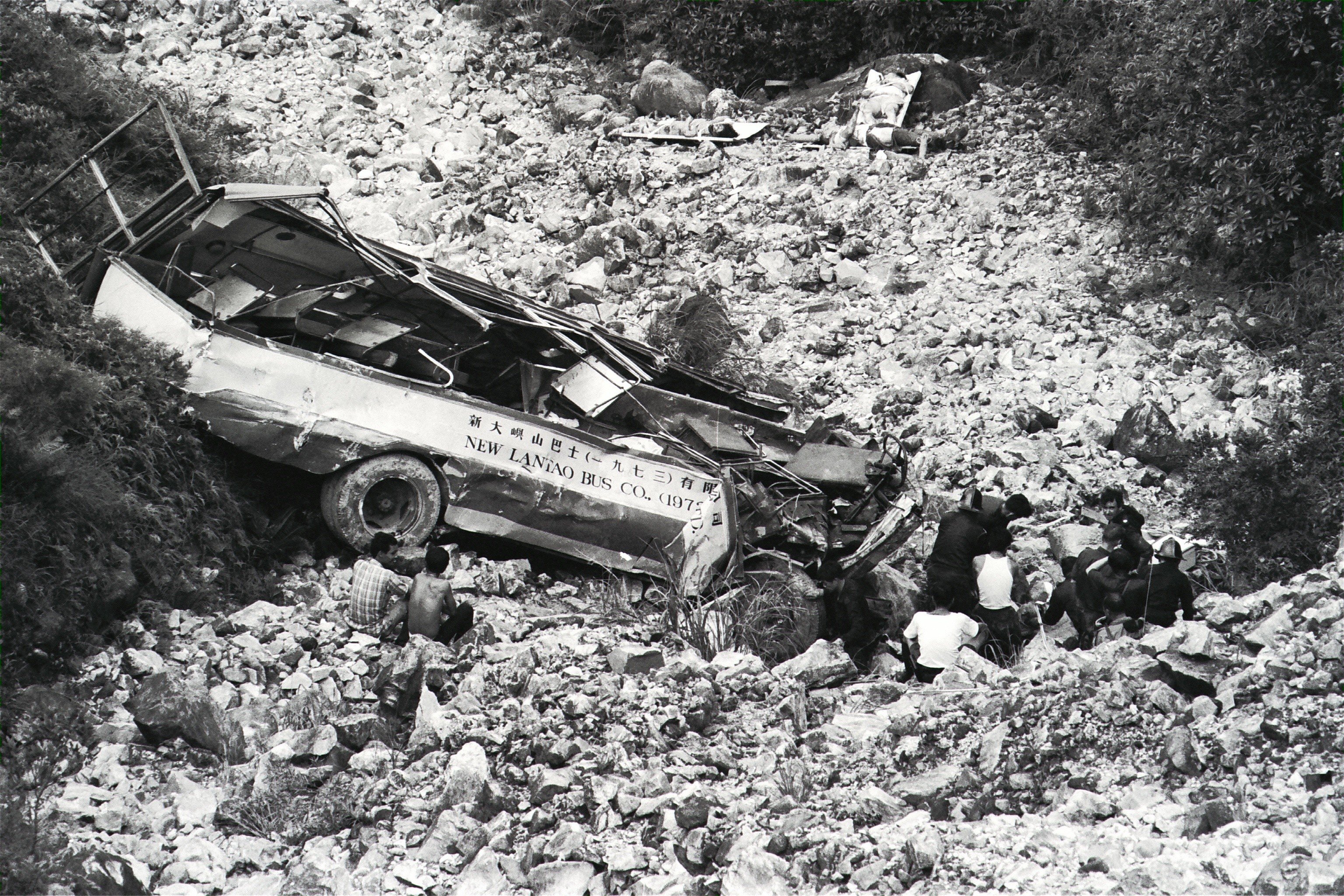 Wreckage of the bus that killed 17 when it “somersaulted 300 ft down a cliff” on Hong Kong’s Lantau Island. Picture: SCMP