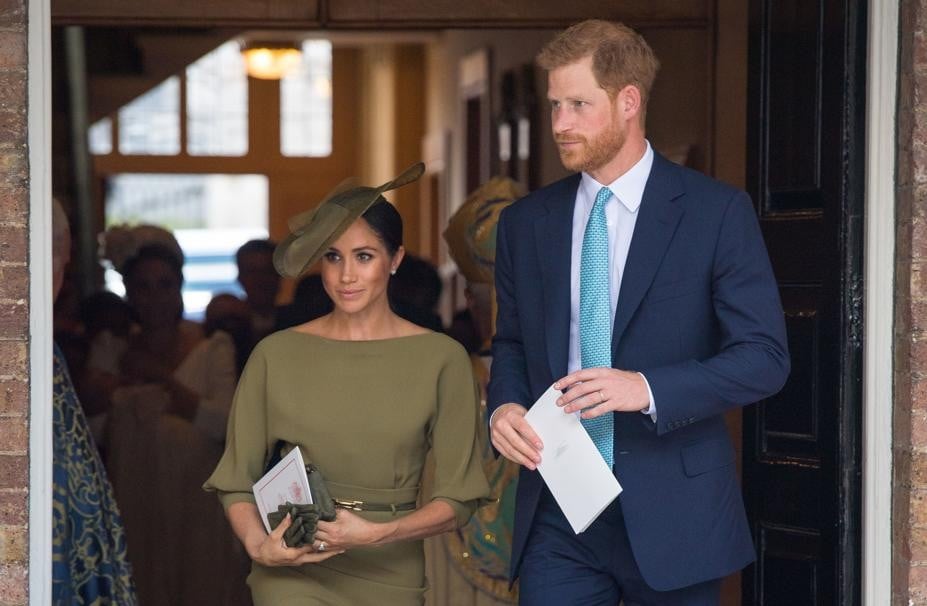 Prince Harry, Duke of Sussex and Meghan, Duchess of Sussex, wearing an olive-green Ralph Lauren dress at the christening of Britain's Prince Louis. Picture: AFP