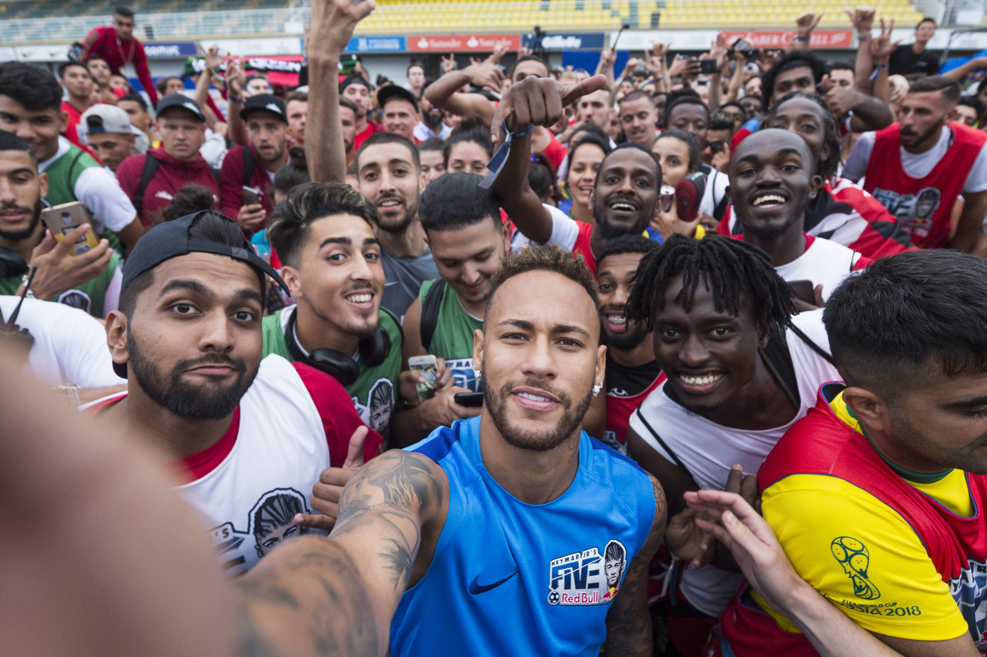 Neymar takes a selfie with players and fans at the Red Bull Neymar Jnr 5s in Instituto Projecto Neymar Jnr, Praia Grande, Brazil. Photos: Red Bull