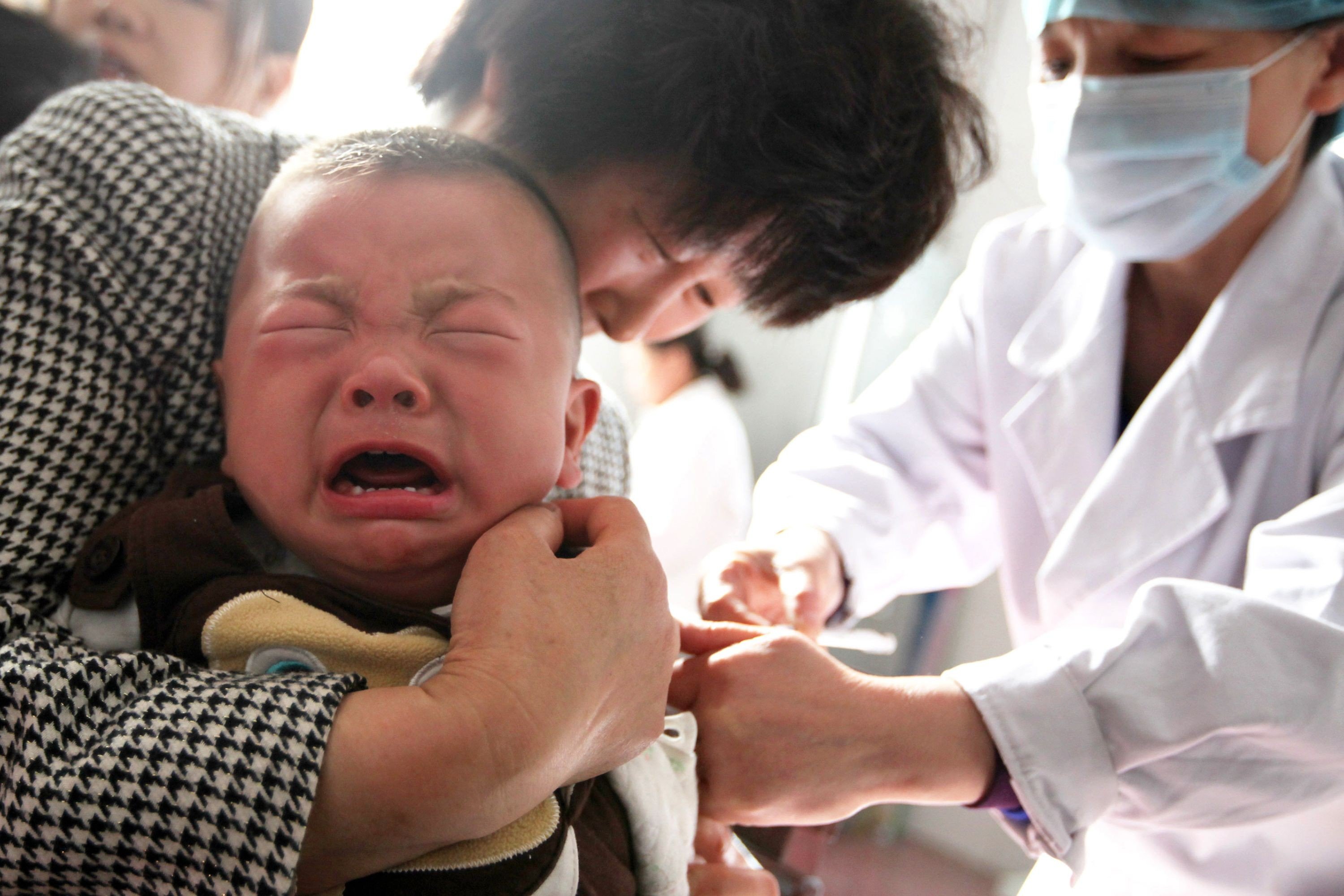 A child receives a vaccination shot at a hospital in Huaibei in China's eastern Anhui province. Photo: AFP