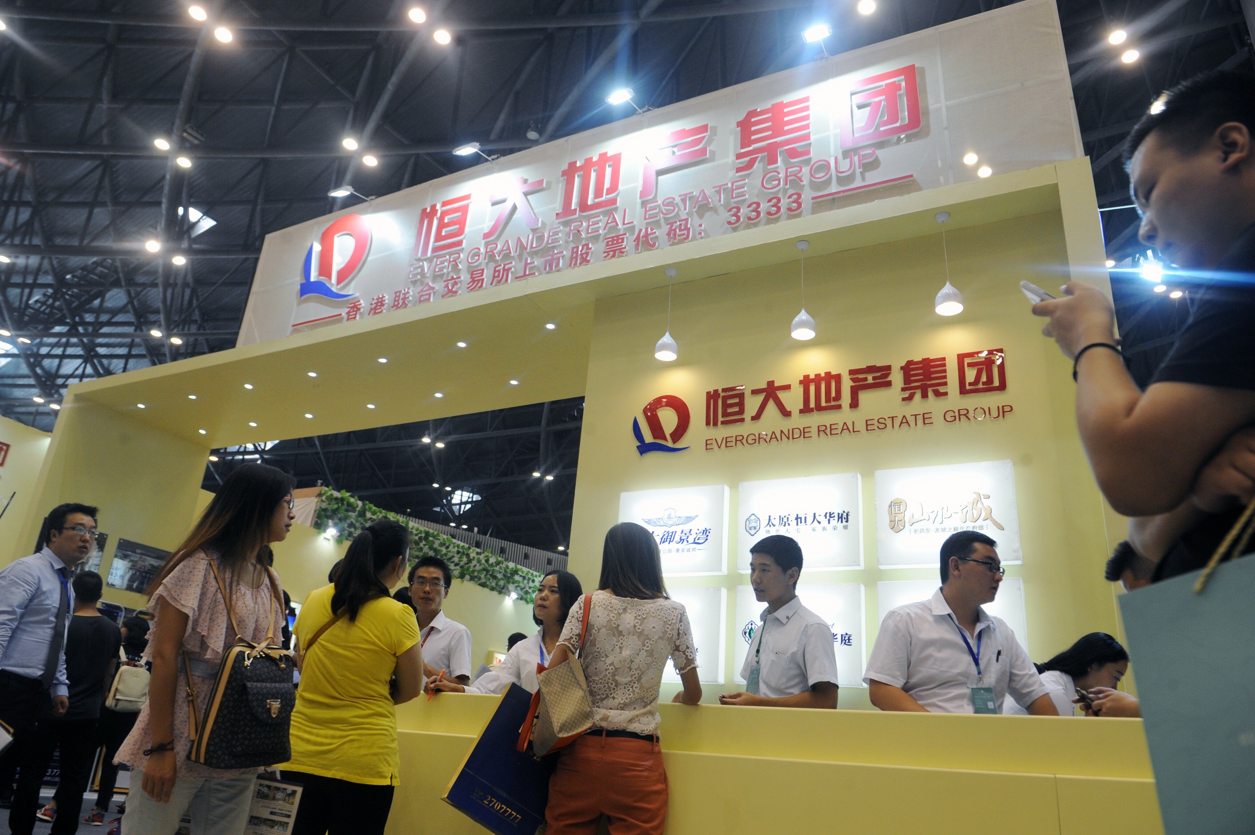 Mainland property stocks, including China Evergrande Group, got a further boost last week when two state-owned banks in Shanghai lowered their first-home mortgage rates to help prop up the property market. Photo: Imaginechina