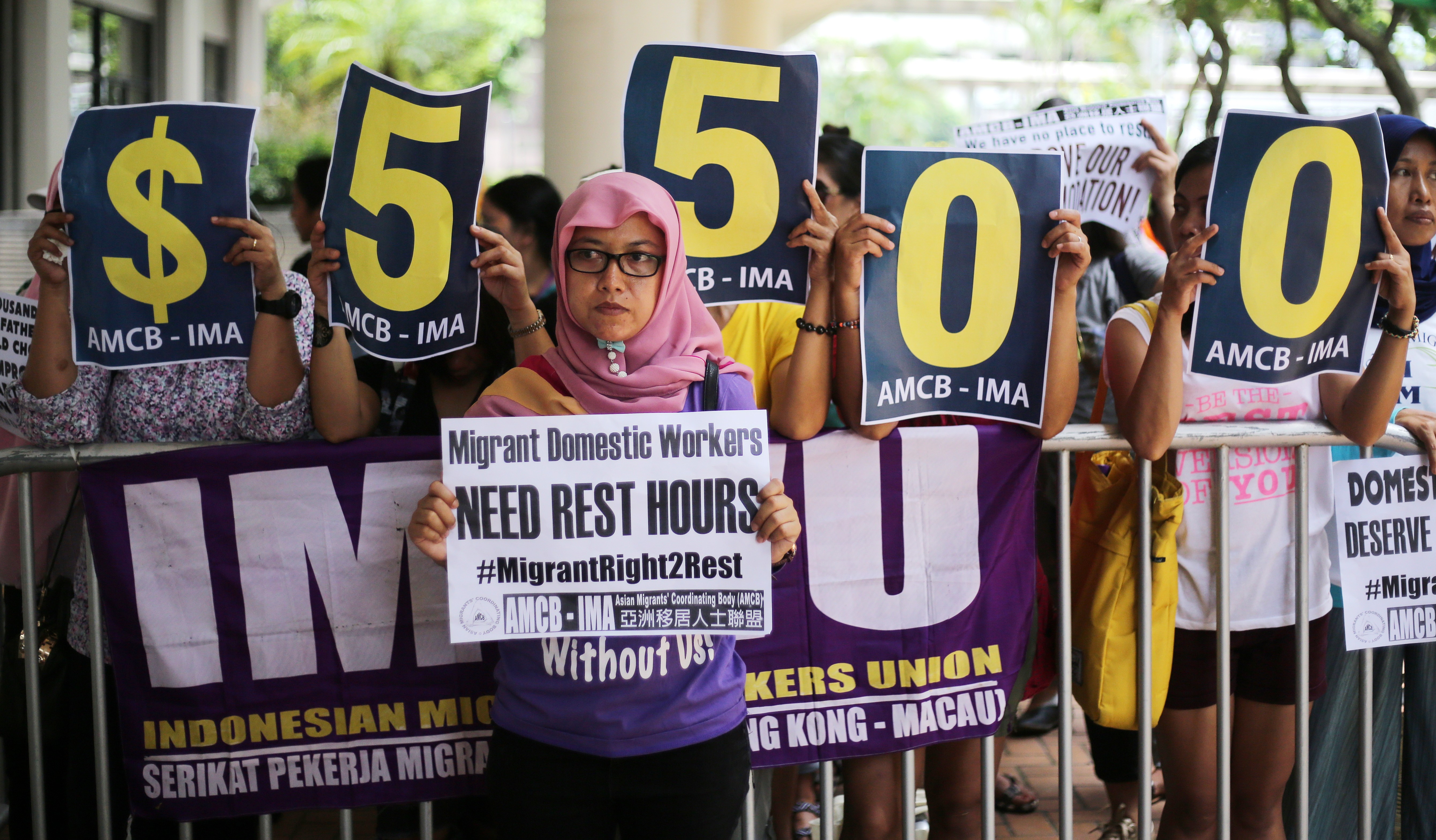 Different groups of domestic workers call for decent wages and better food allowances. Photo: Winson Wong