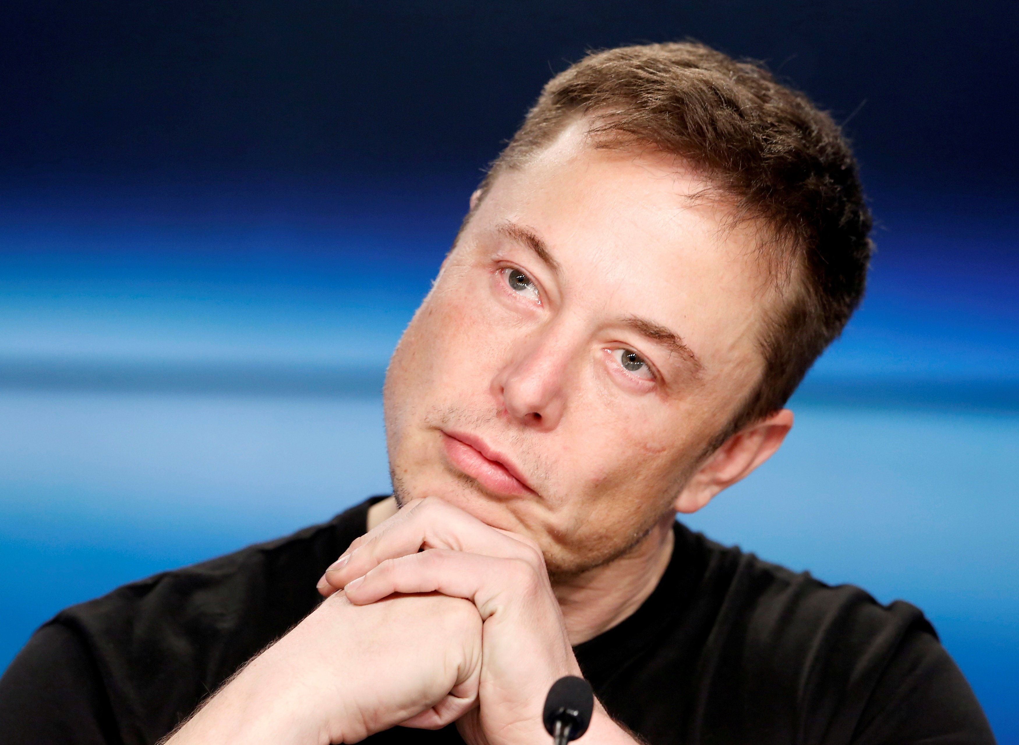 Elon Musk listens at a press conference following the first launch of a SpaceX Falcon Heavy rocket at the Kennedy Space Centre in Cape Canaveral, Florida, on February 6. Musk recently caused a flurry when he tweeted his intention to take Tesla, the carmaker he founded, private. Photo: Reuters