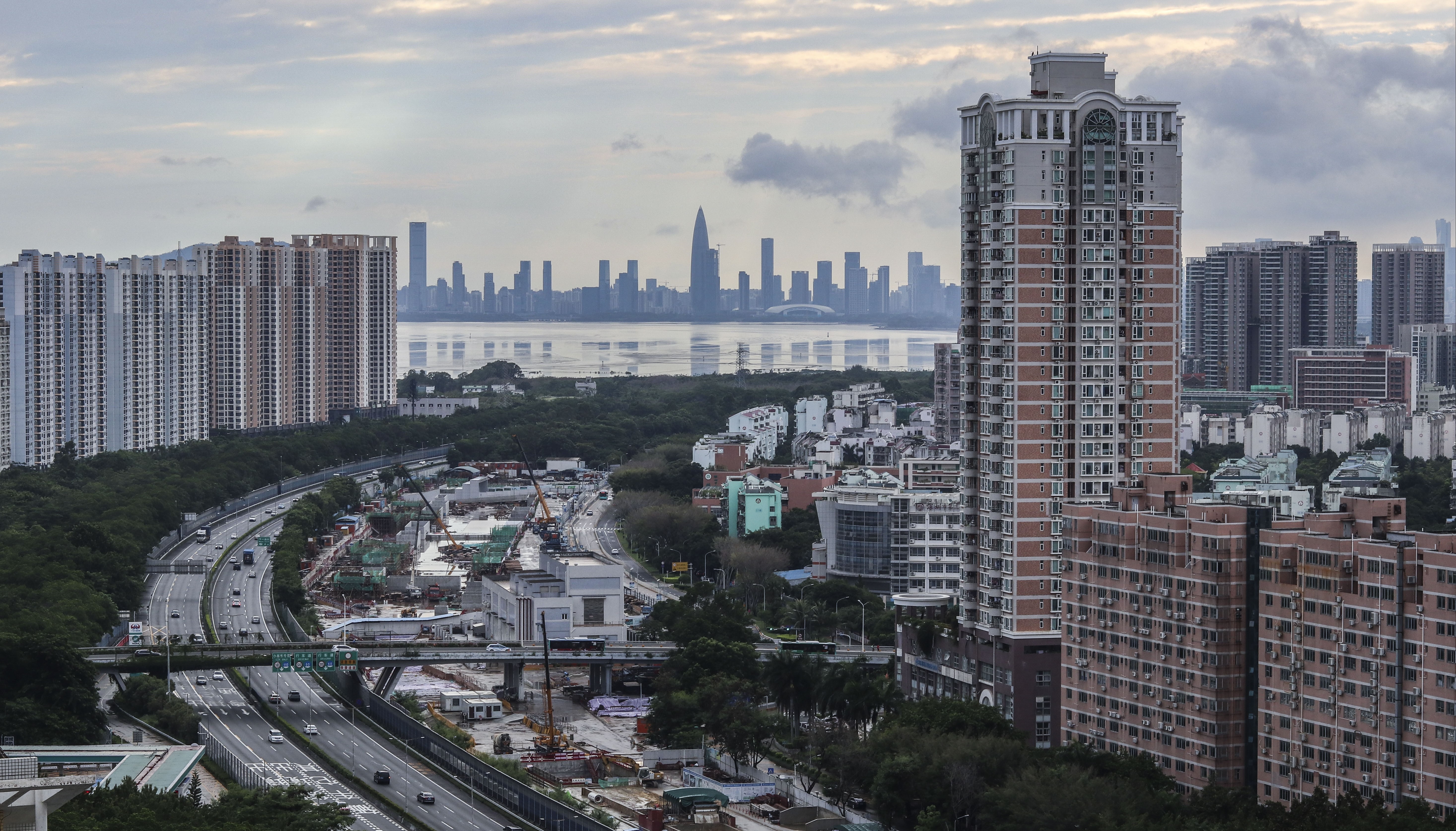 Image showing the Beijing-Hong Kong-Macau expressway by residential buildings taken from the Futian district of Shenzhen, which is one of 11 cities included in the Greater Bay Area project. 12AUG18 SCMP / Roy Issa