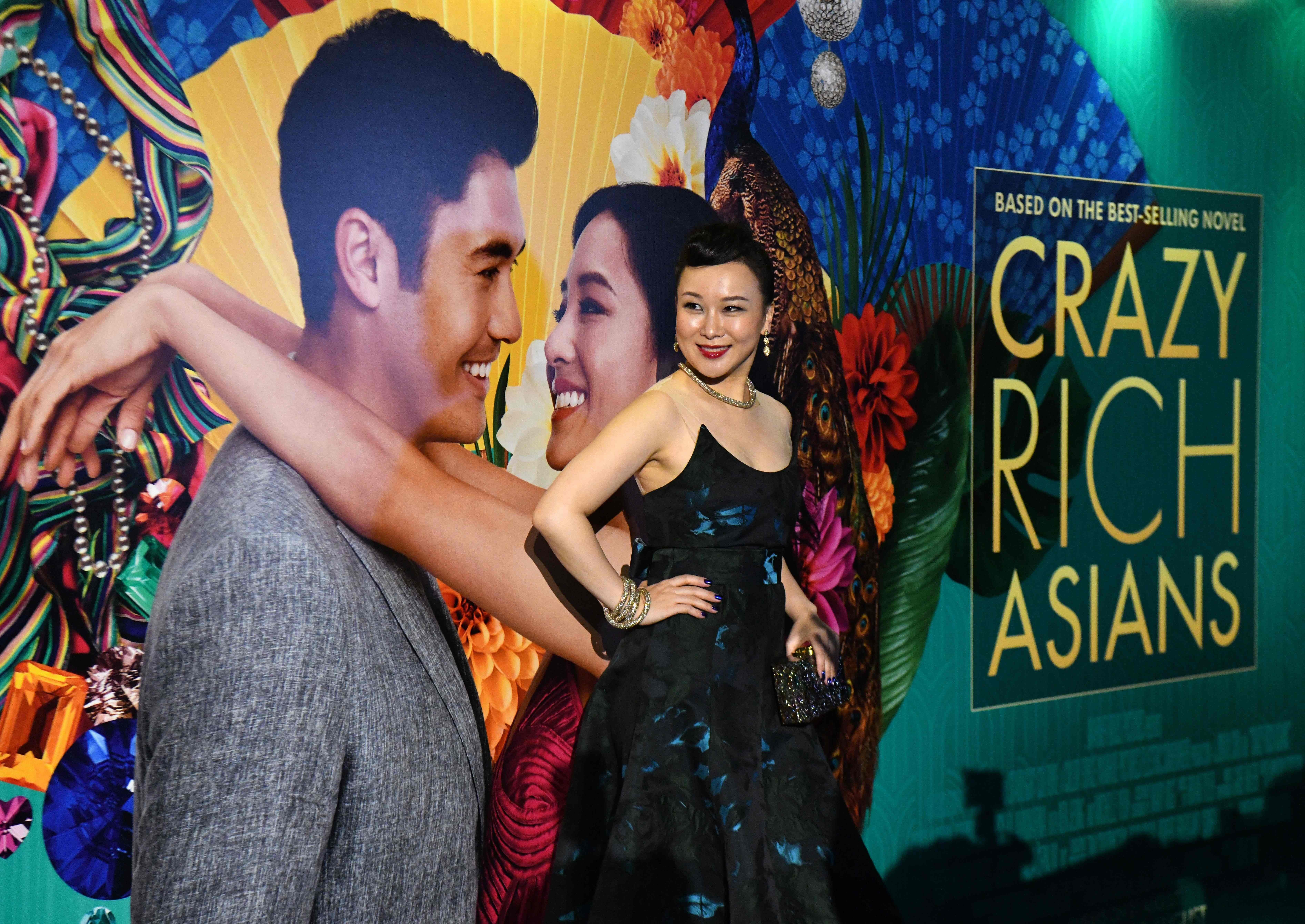 Chinese jazz singer Jasmine Chen, who performed in the film, poses at the premiere of the film Crazy Rich Asians at Capitol Theatre in Singapore on August 21. Will the film’s portrayal of Asia’s ultra rich leave the audience with the wrong impression that all Asians are rich and live fanciful lives? Photo: AFP