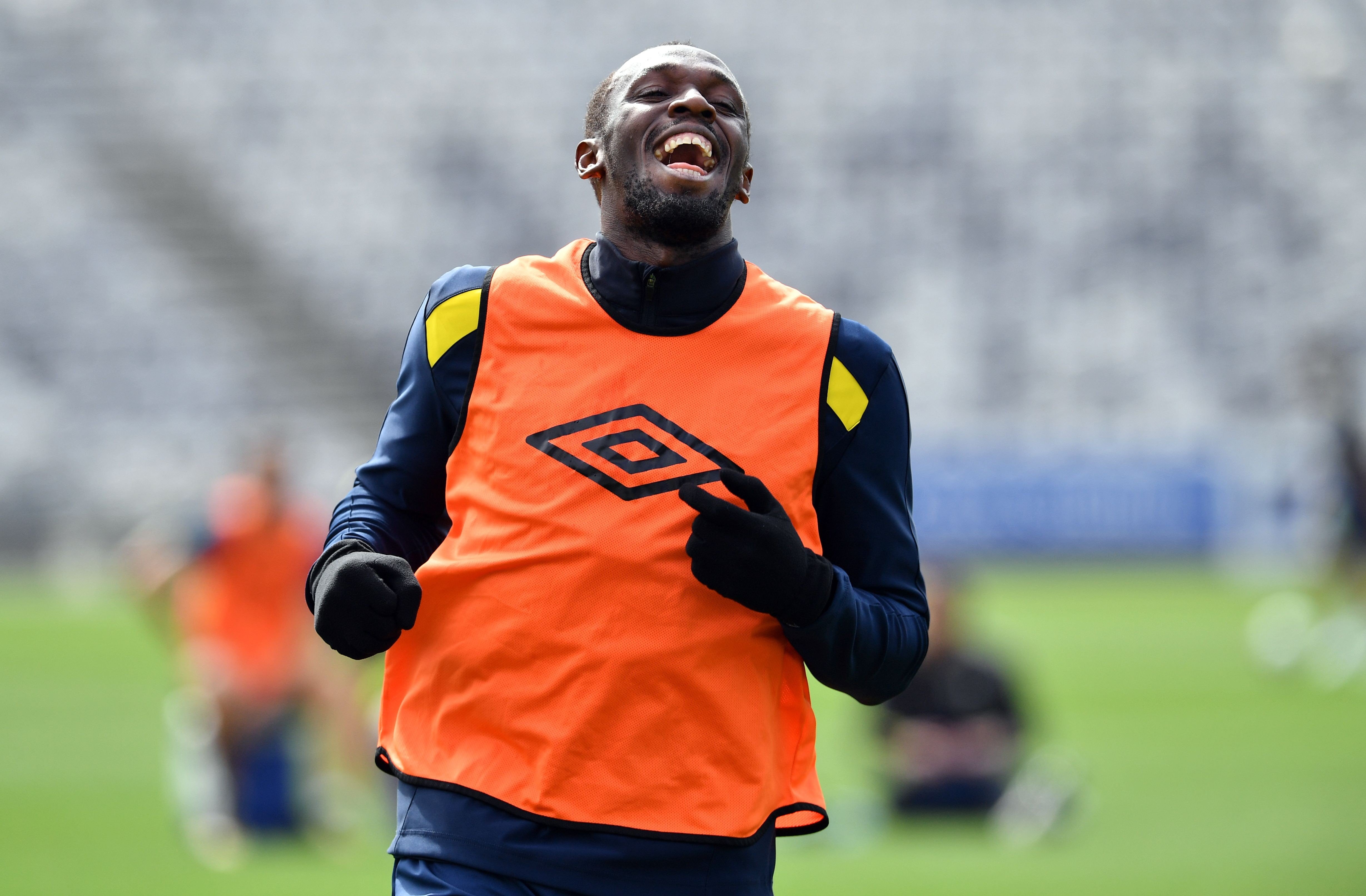 Olympic champion Usain Bolt trains with A-League football club Central Coast Mariners in Gosford. Photo: AFP