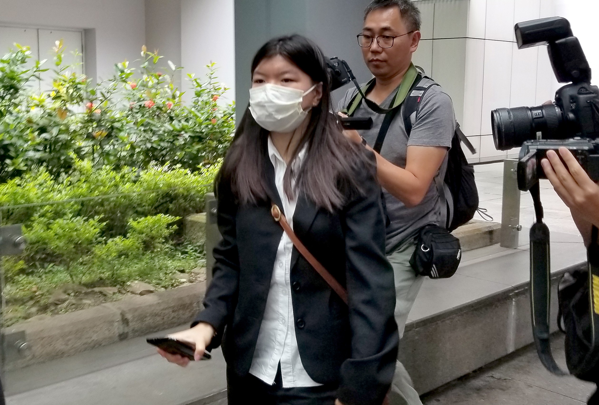 Khaw May Ling leaves the High Court after testifying in the murder trial of her father Khaw Kim Sun. Photo: Chris Lau