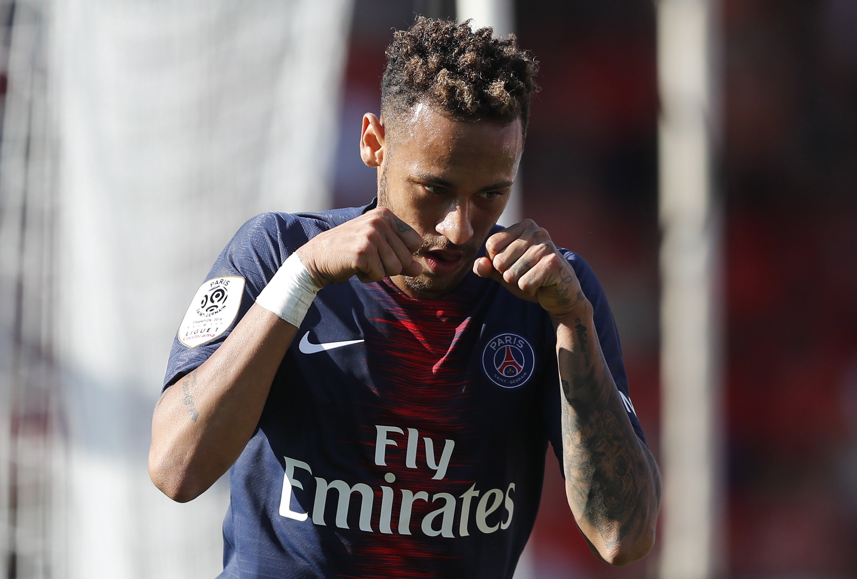 Paris Saint-Germain forward Neymar celebrates after scoring a goal during the French Ligue 1 soccer match against Nimes Olympique. Photo: EPA