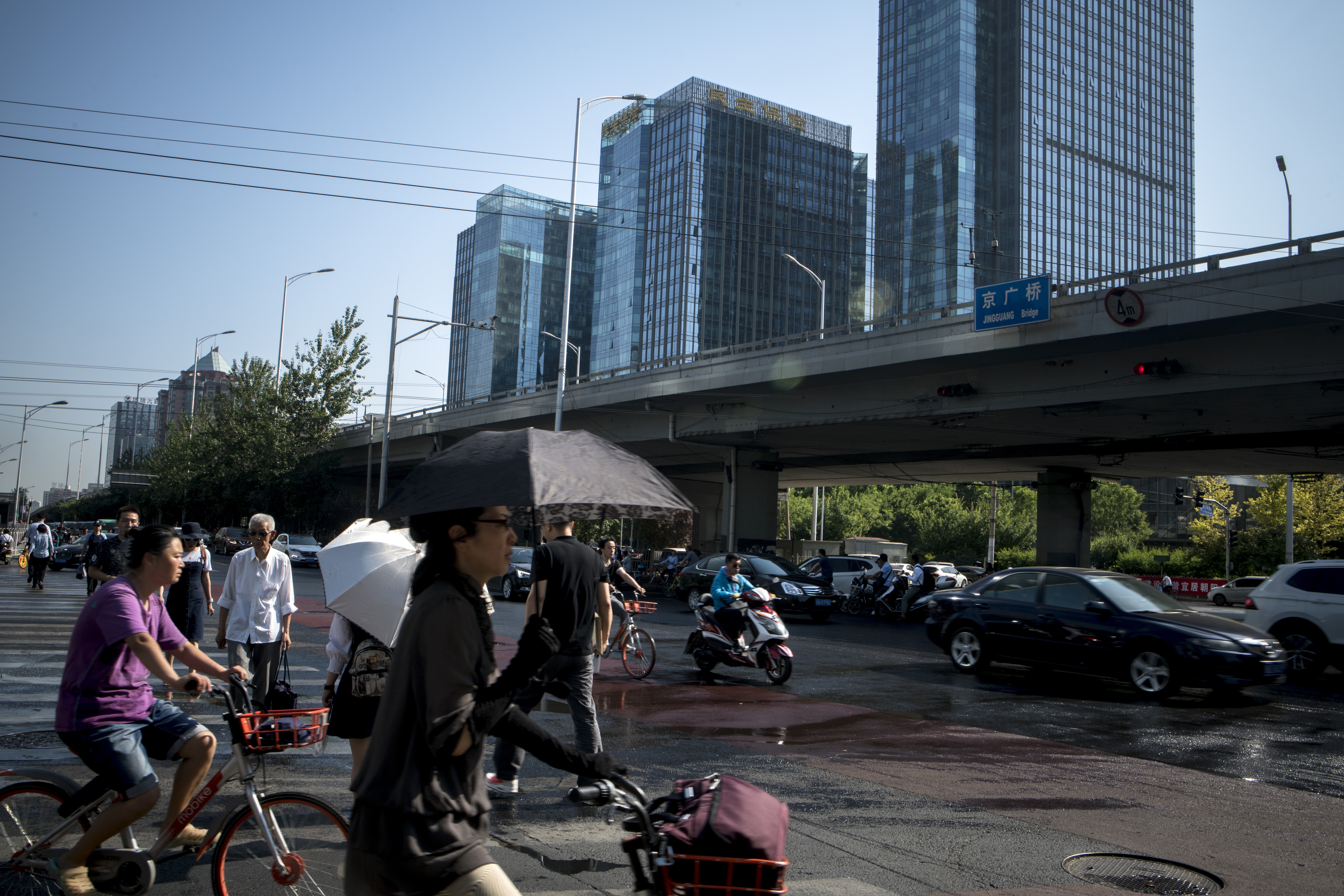 A more strict collection of social security taxes will cut corporate profits by 2.5 per cent and chip 0.6 percentage points from China’s normal economic growth. Photo: Bloomberg