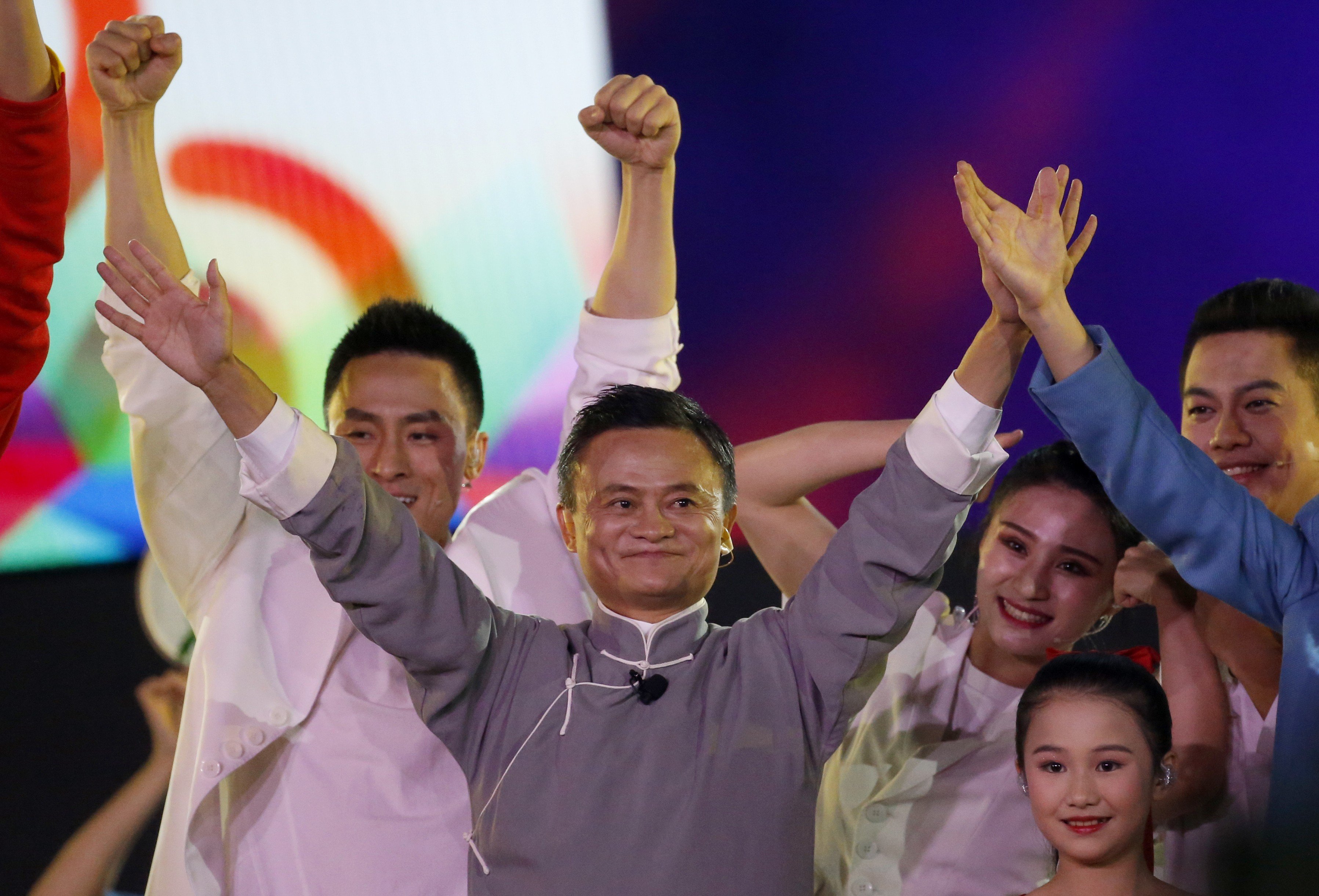 Jack Ma, executive chairman of Alibaba Group, waves to the audience during the closing ceremony for the 18th Asian Games in Jakarta, Indonesia. Photo: AP