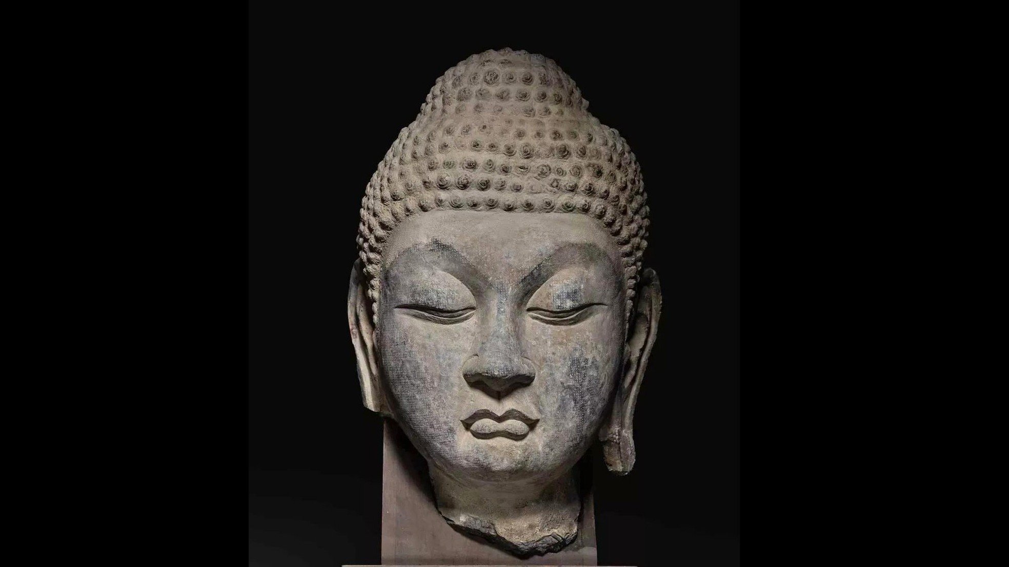 A Buddha head from the Tang dynasty may have originated from a world heritage monument site
