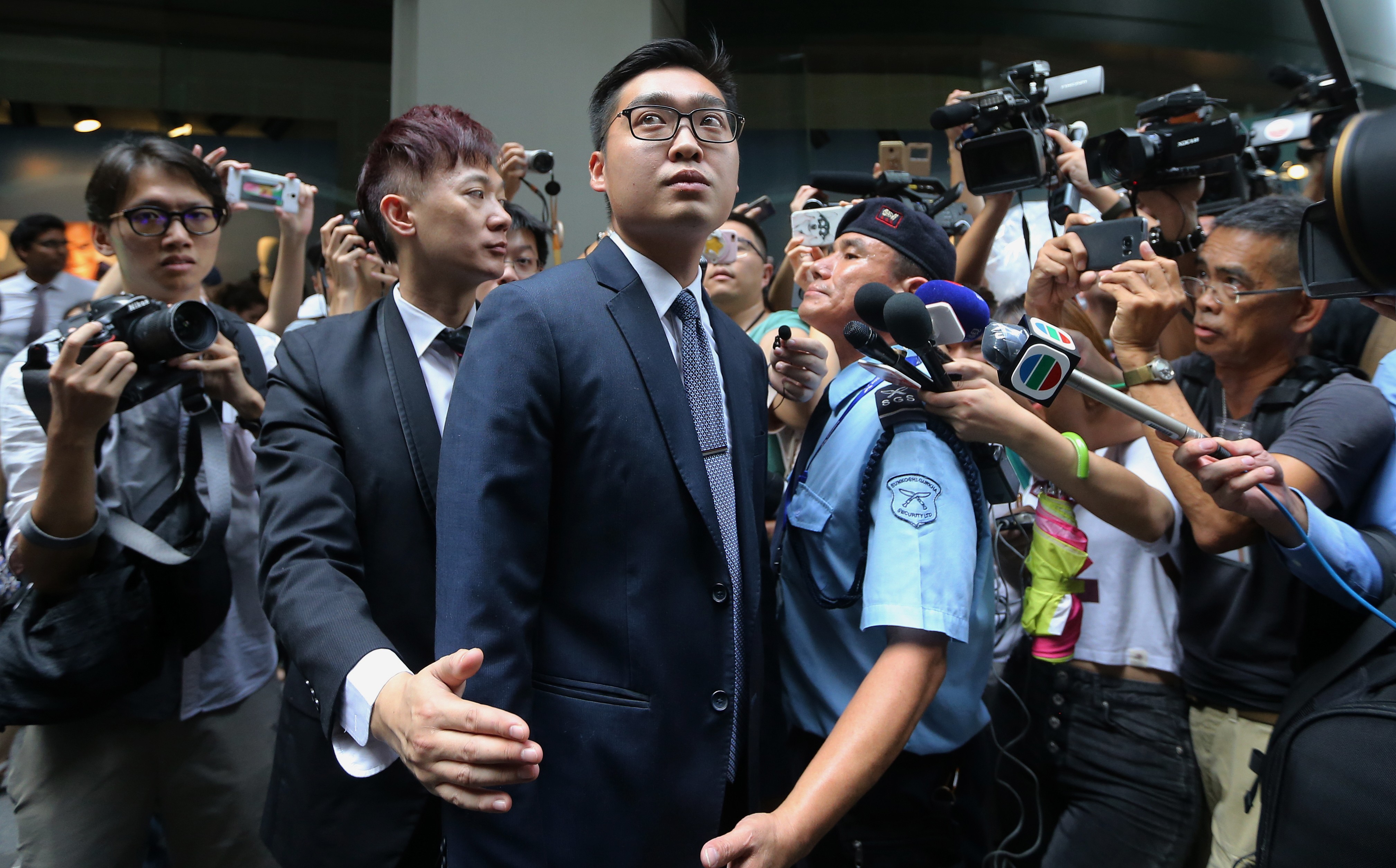 Andy Chan Ho-tin, convenor of the Hong Kong National Party, leaves the Foreign Correspondents' Club. Photo: Sam Tsang