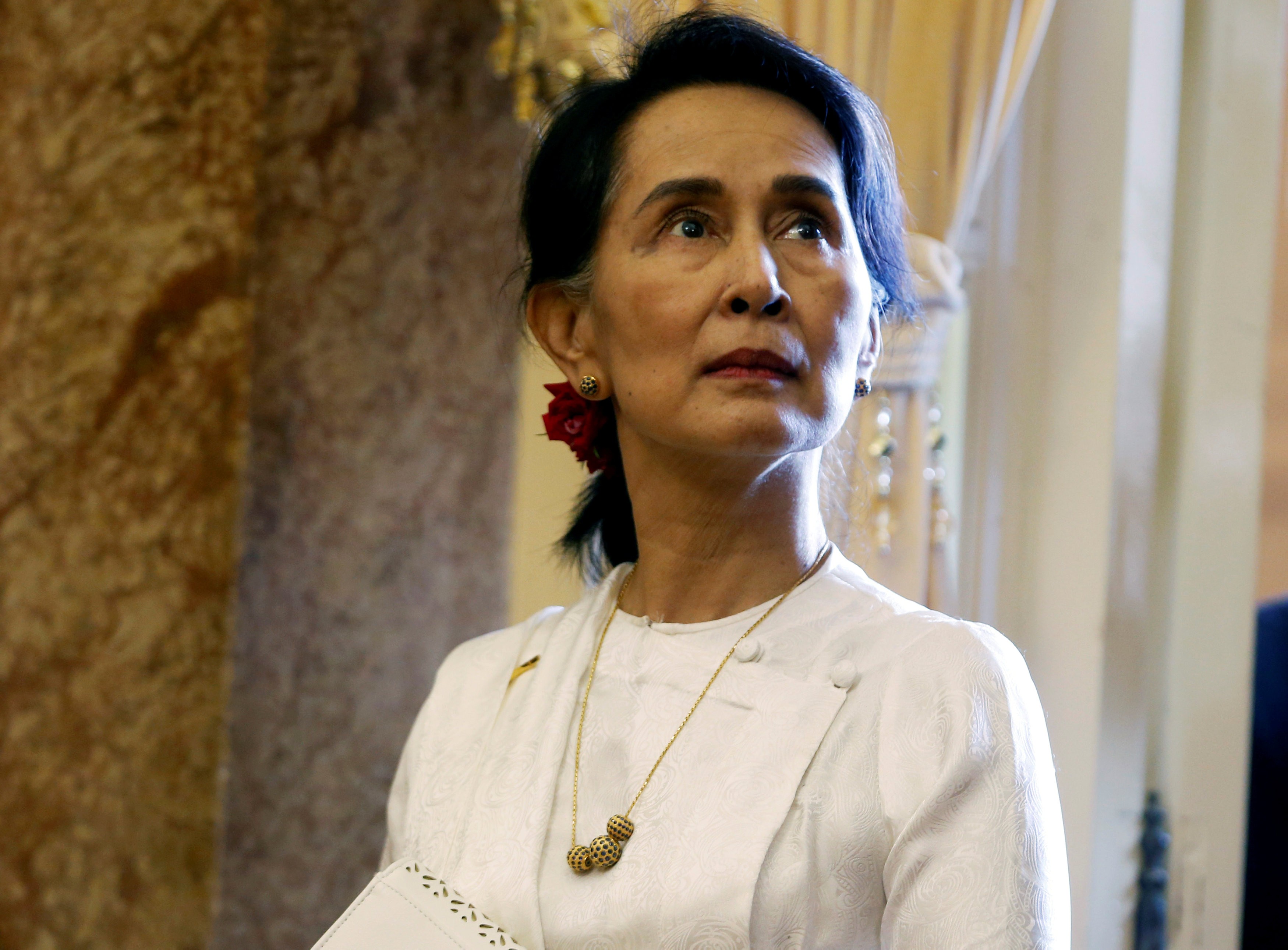 Myanmar's State Counsellor Aung San Suu Kyi waits for a meeting with Vietnam's President Tran Dai Quang in Hanoi on September 13. Photo: Reuters