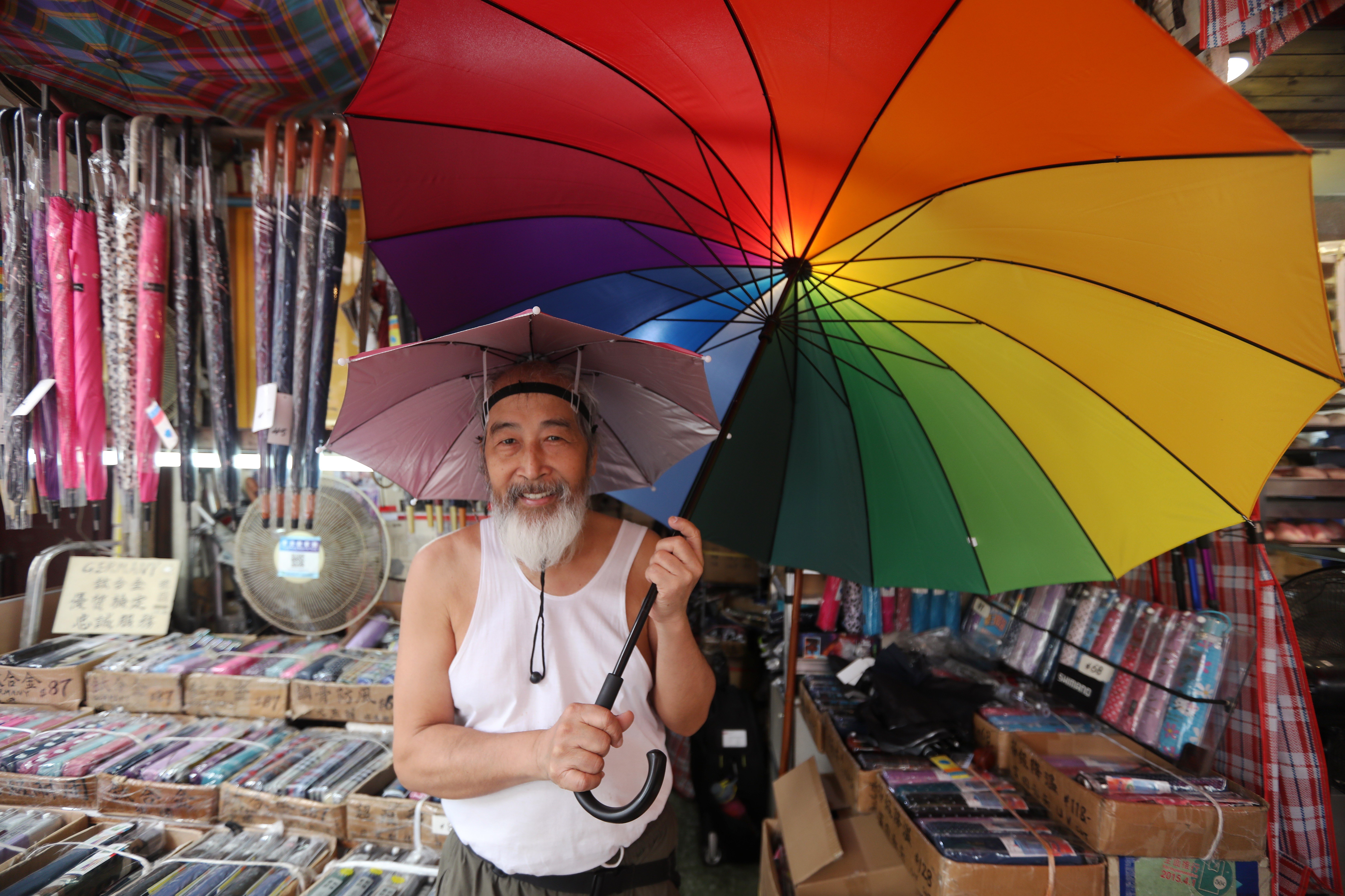 ‘Brother Wai’, as Yau is affectionately known, is a fifth-generation umbrella salesman and repairman. Photo: Xiaomei Chen