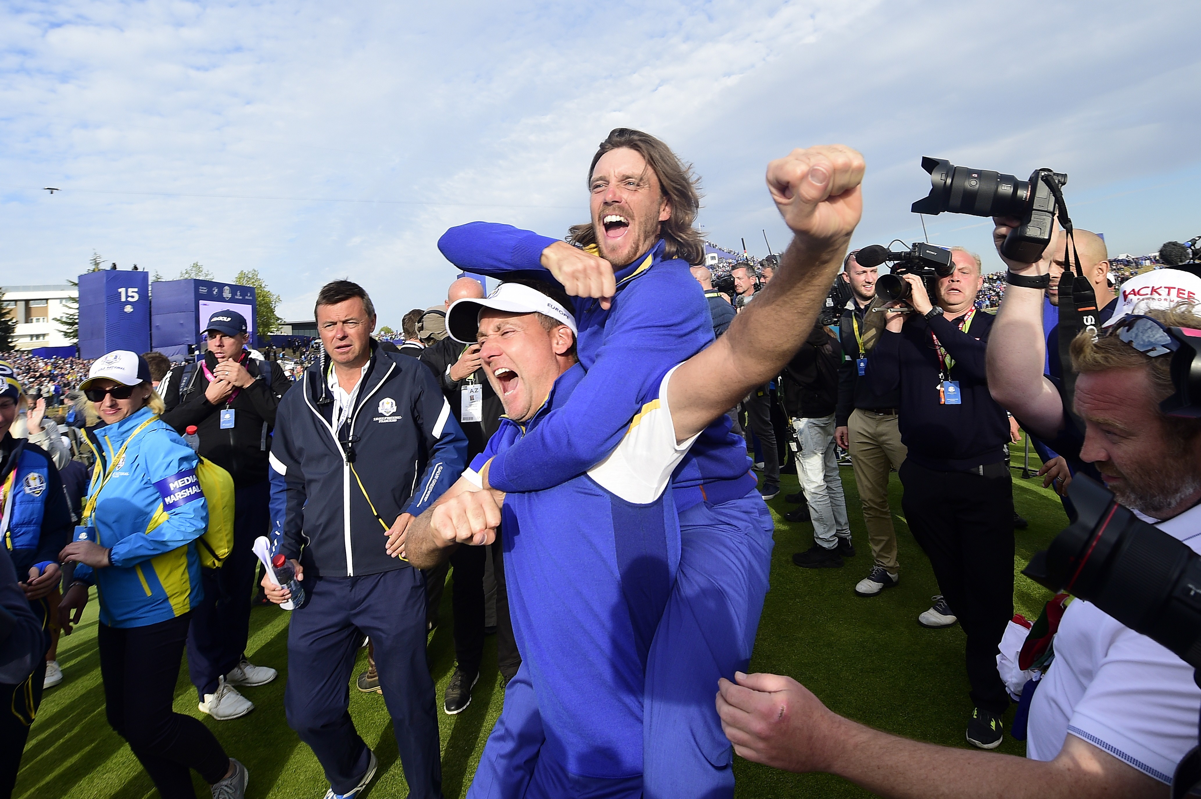 England’s Ian Poulter (left) and Tommy Fleetwood celebrate Europe winning the 2018 Ryder Cup, on the final day of the competition on September 30 at The Golf National in Guyancourt, near Paris, France. Photo: EPA-EFE