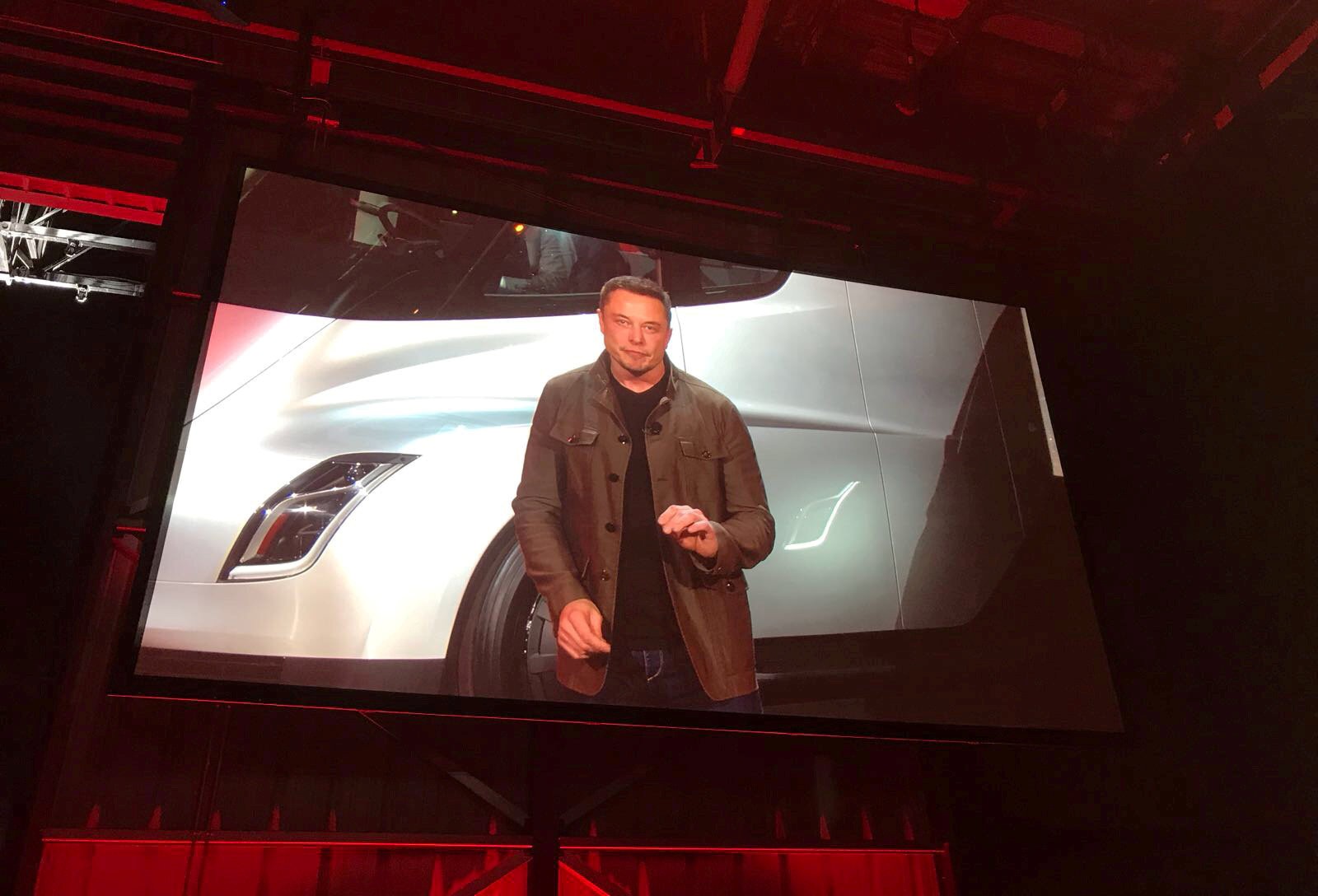 Tesla CEO Elon Musk appears on screen as he unveils the company’s new electric semi truck during a presentation in California, in November last year. It seems pretty certain that Tesla would not even exist were it not for Musk. Photo: Reuters