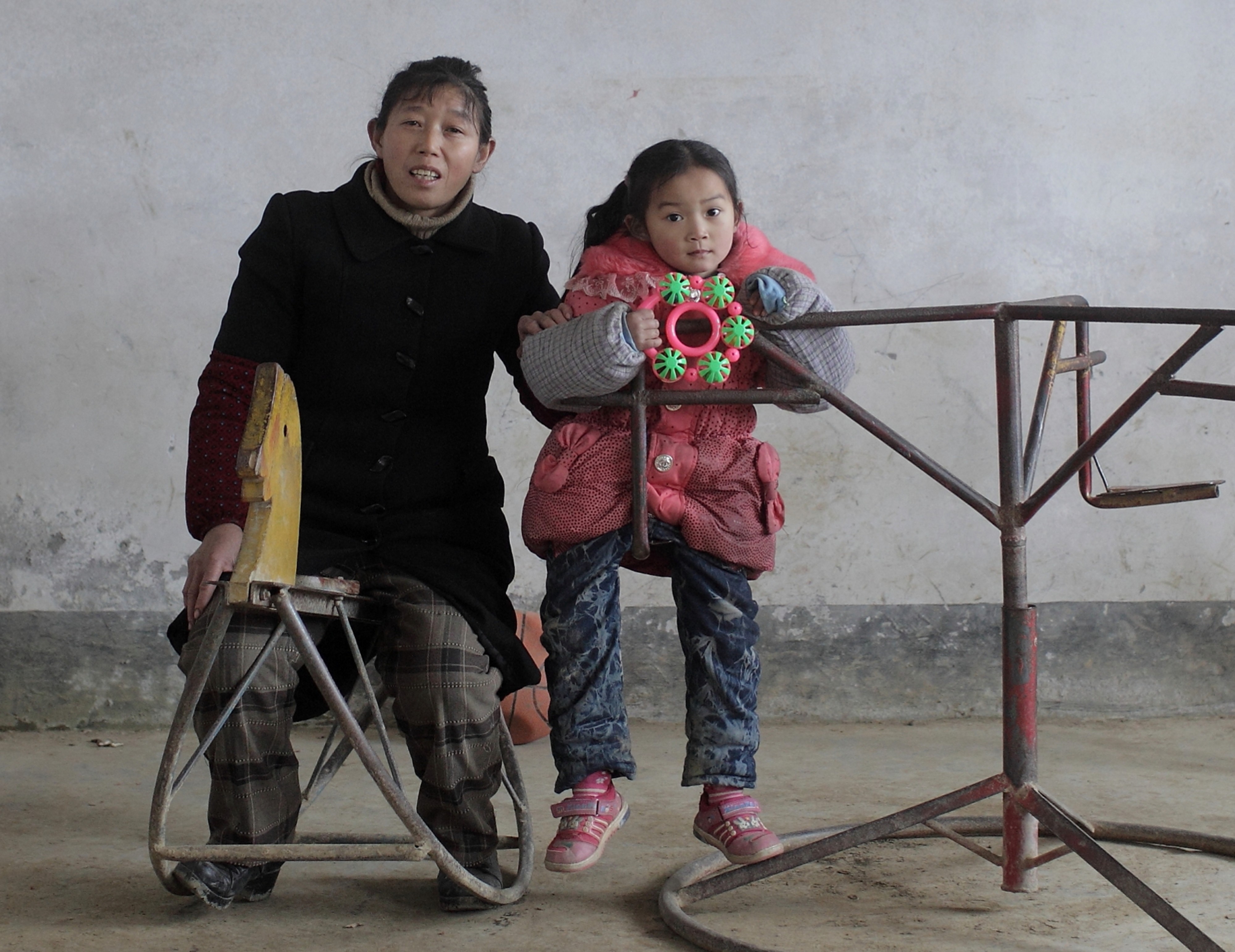 An image from Fu Yongjun’s award-winning 2012 portrait series depicting children in the village of Zhangmu, Chongqing, with their teacher, Fu Huaying. Photo: Handout