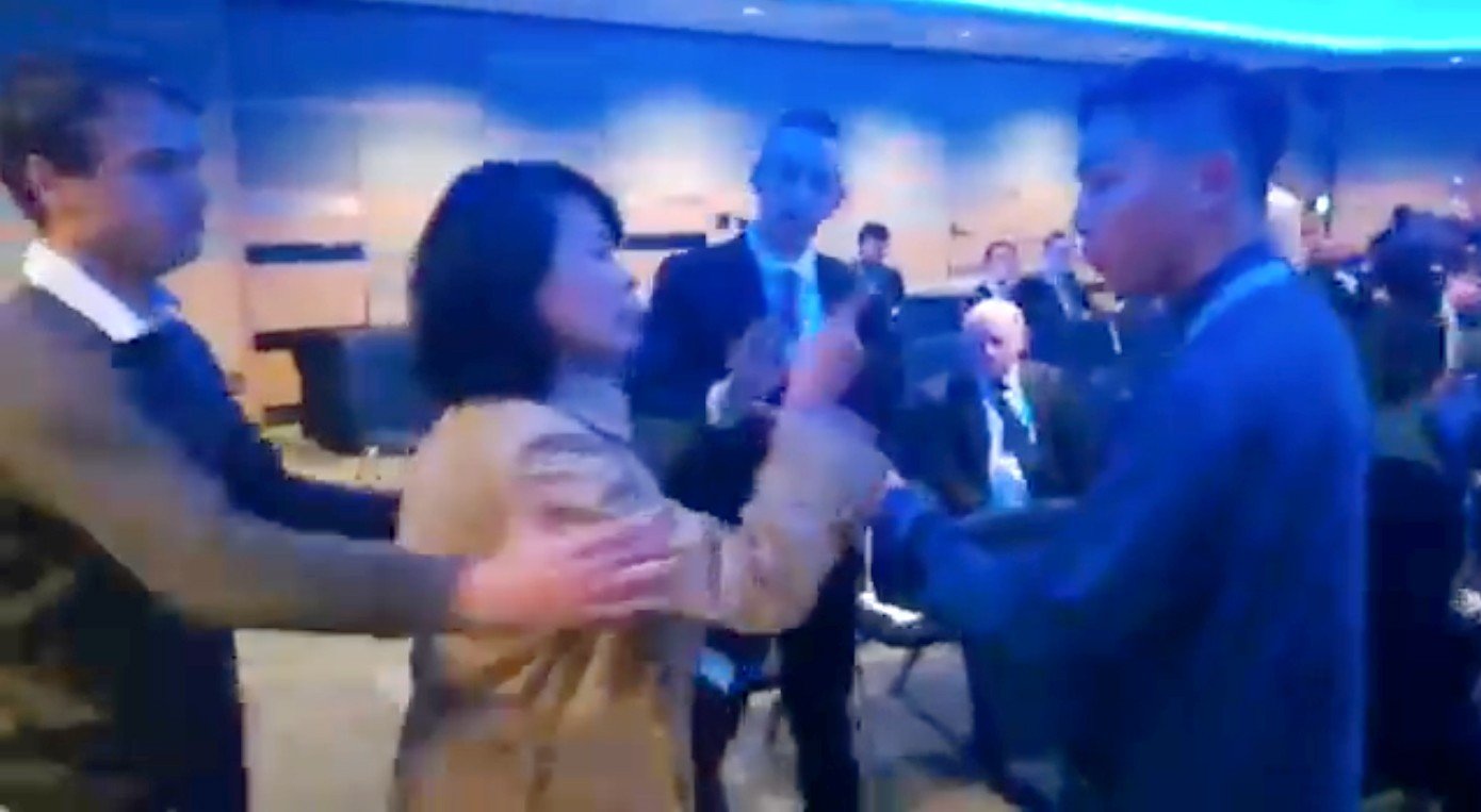 China Central Television reporter Kong Linlin berates a student volunteer at a conference co-organised by the London-based human rights NGO Hong Kong Watch and Britain’s Conservative Party Human Rights Commission. Photo: Facebook