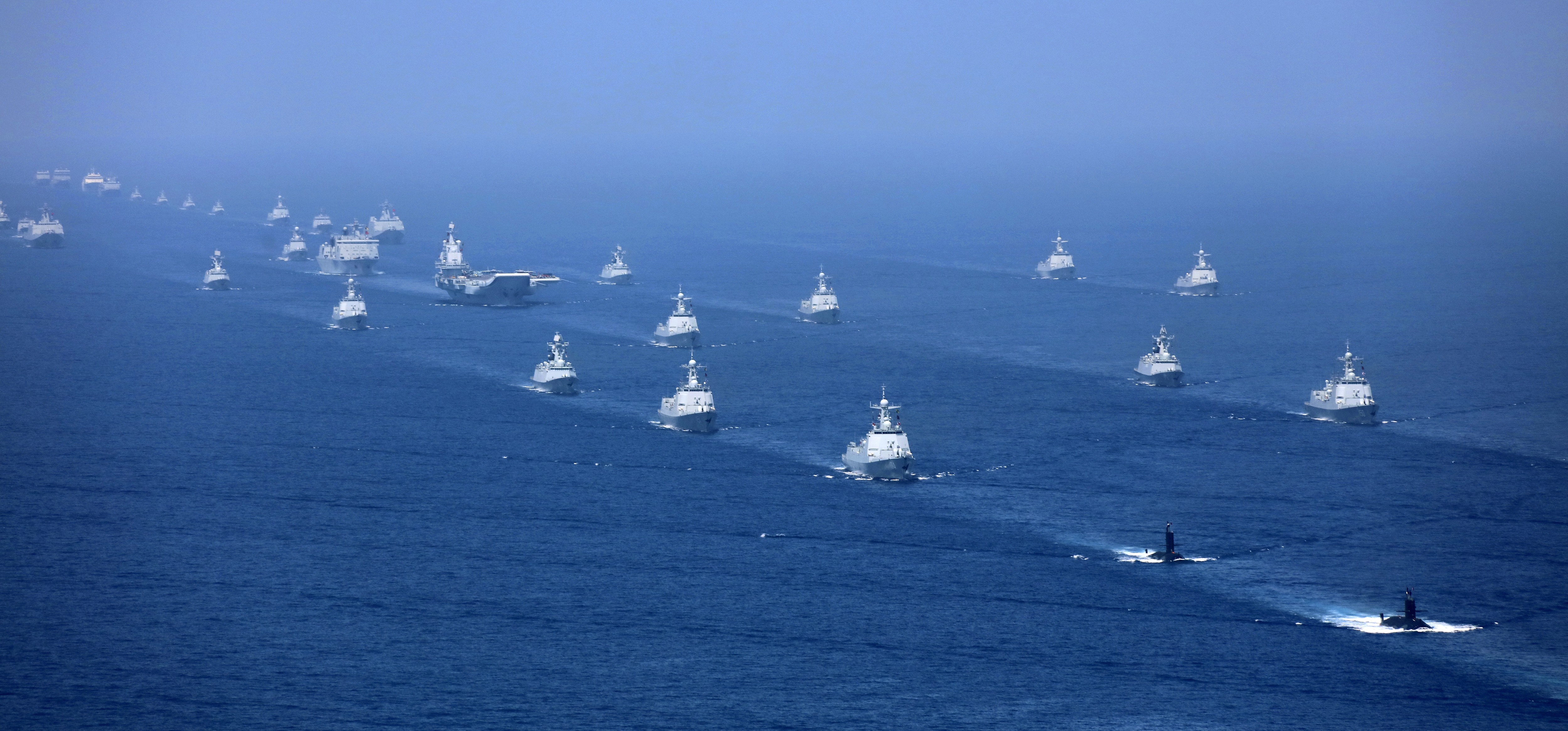 A Chinese fleet accompanies its aircraft carrier the Liaoning in the South China Sea. Photo: AP