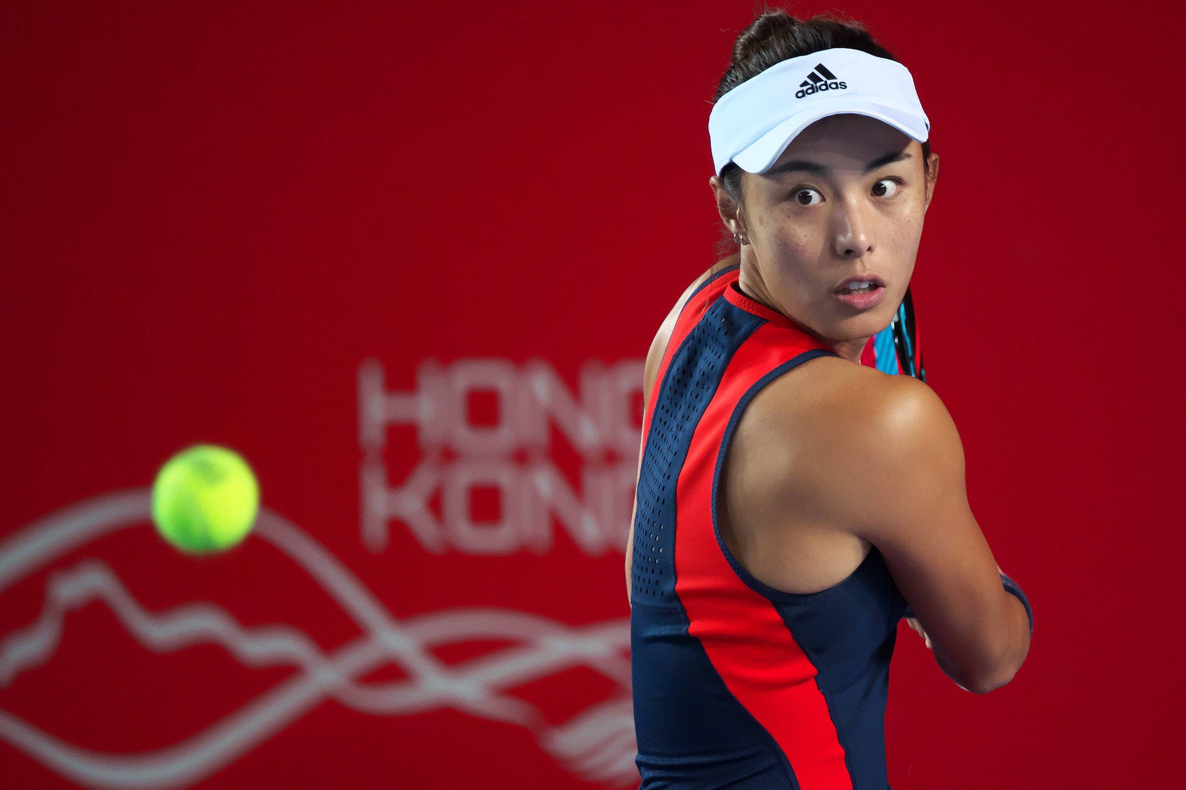 Wang Qiang returns the ball to Christina McHale at the Hong Kong Open. Photo: Andy Cheung/Hong Kong Tennis Open/ArcK Photography