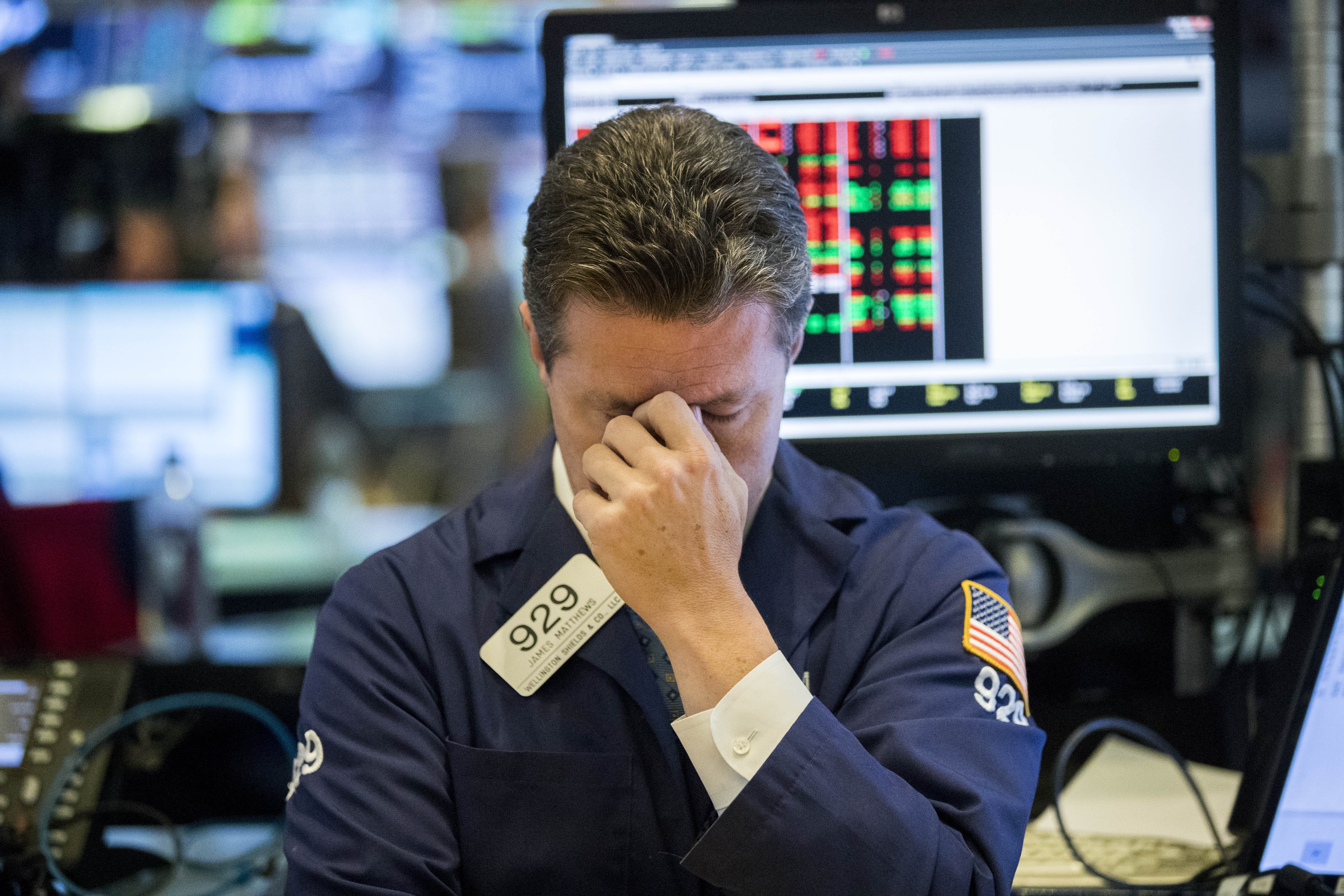 A trader at the New York Stock Exchange on October 11 – a day when US stocks suffered deep losses in volatile trading. Photo: Xinhua