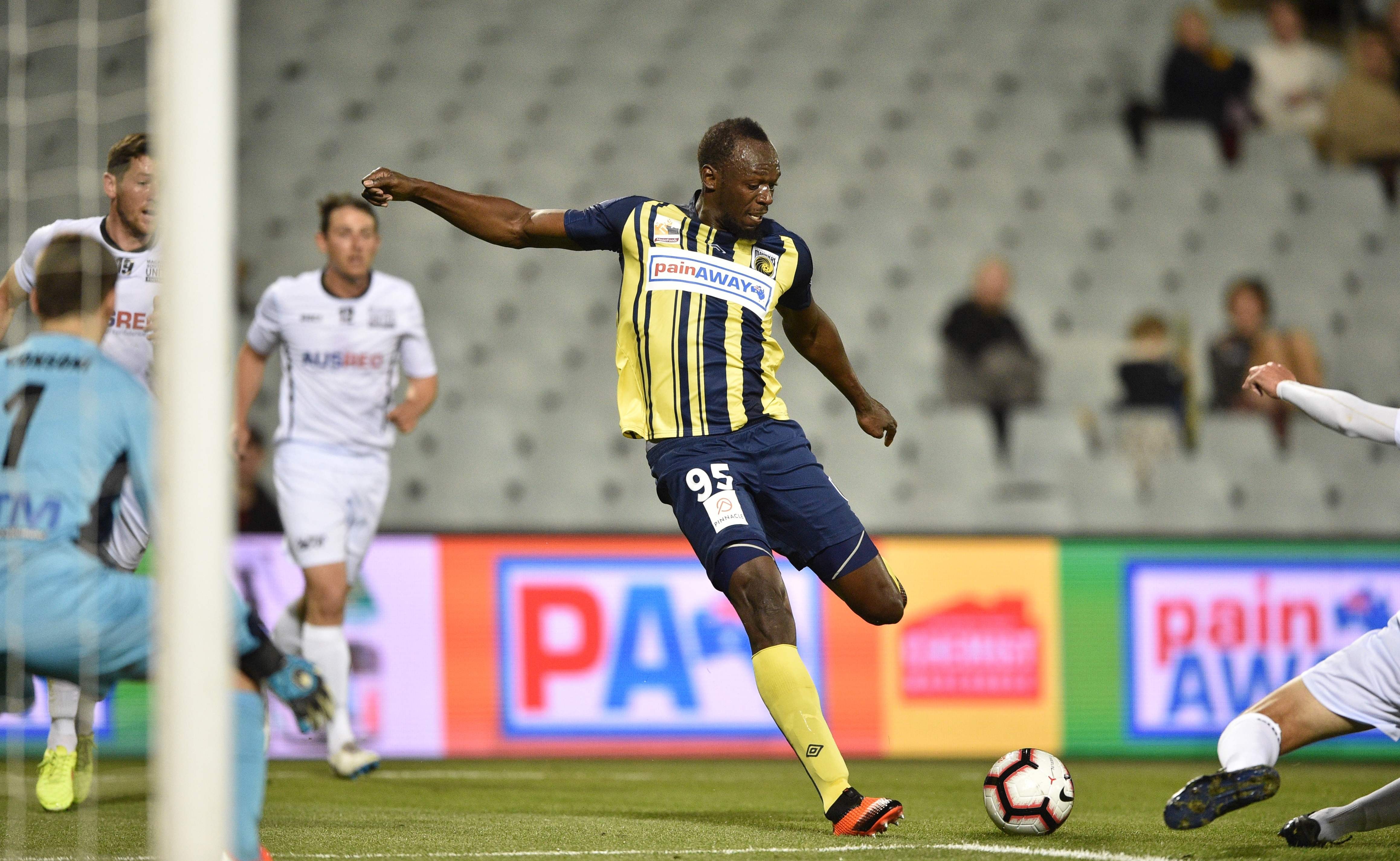 Olympic sprinter Usain Bolt (centre) played for A-League side Central Coast Mariners as part of a trial and grabbed two goals. Photo: AFP