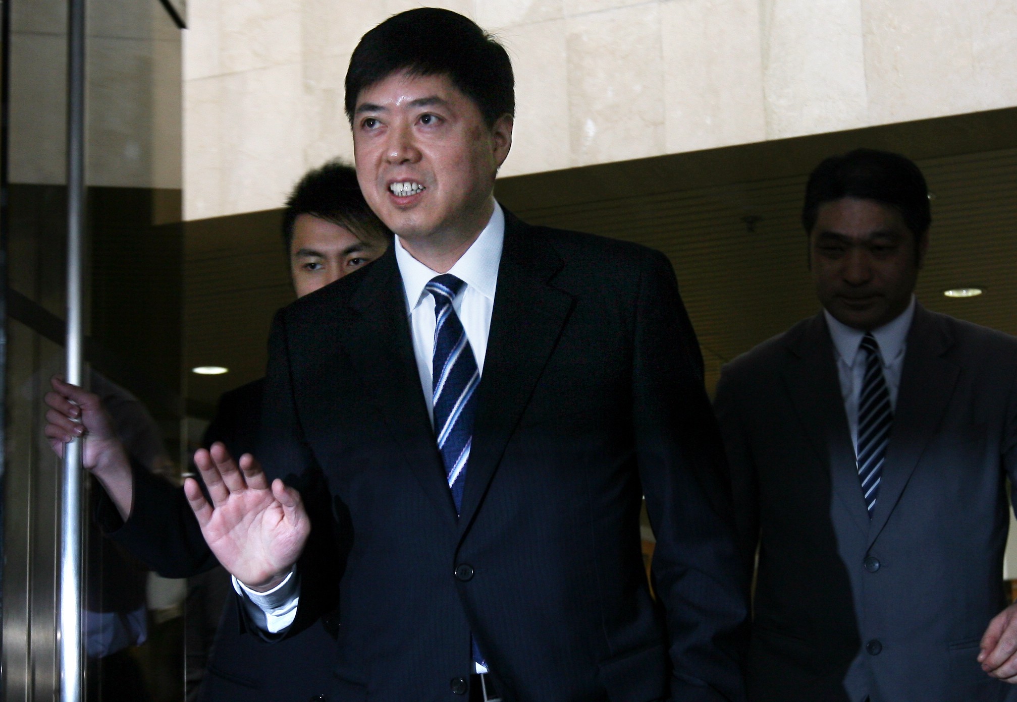 Hong Kong businessman Stephen Lau Hei-wing shown in June 2009, leaving the High Court after testifying. A Chinese court has jailed nine former prosecutors over his death in custody last year. Photo: KY Cheng