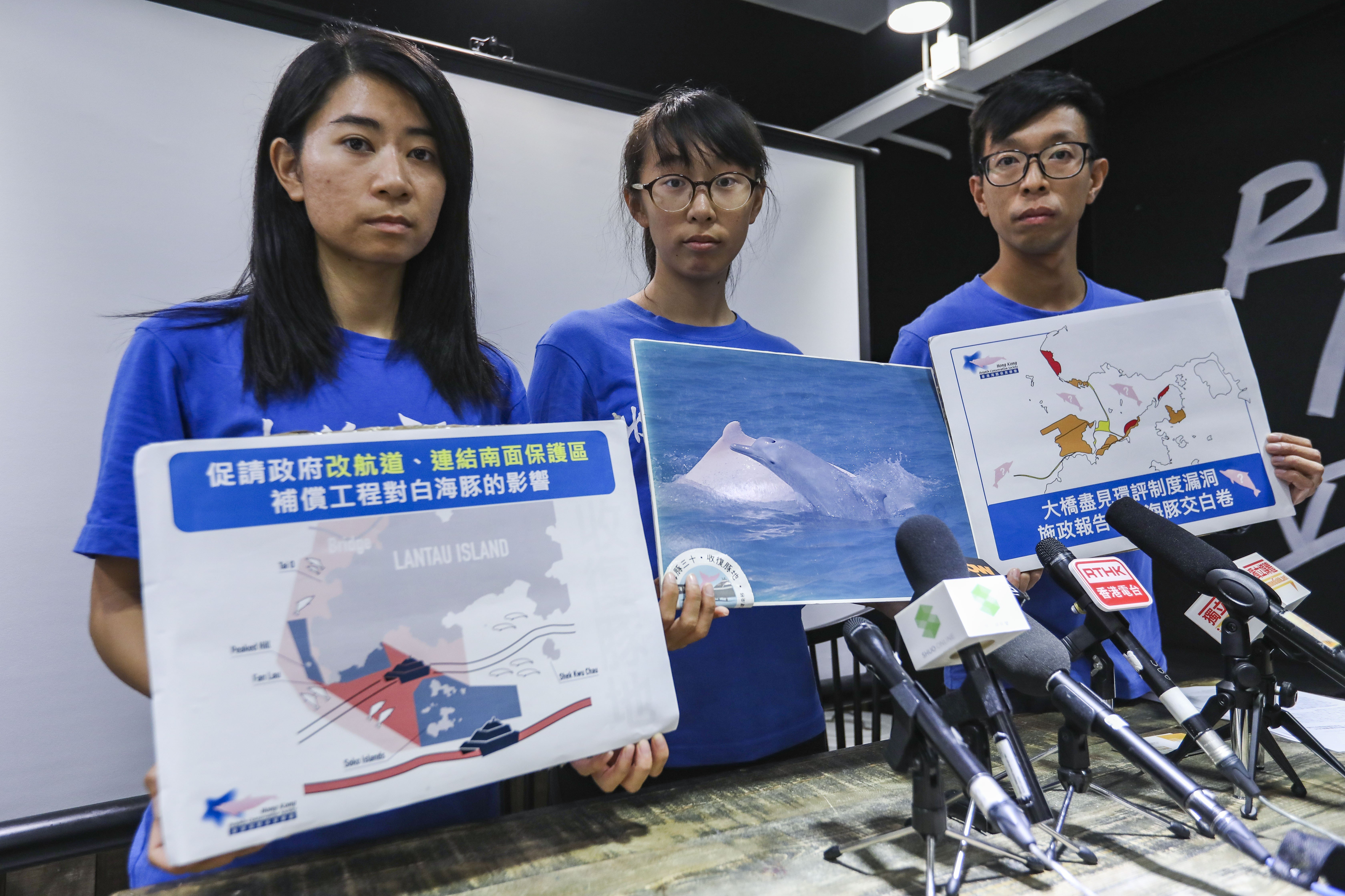 Members of the Hong Kong Dolphin Conservation Society call upon the government to conserve marine life before developing a new artificial island off Lantau, in Mong Kok on October 22. Photo: Nora Tam