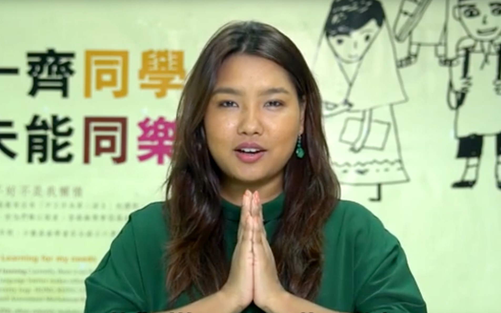 An explanatory video with a host speaking Nepali. Photo: Hong Kong Unison