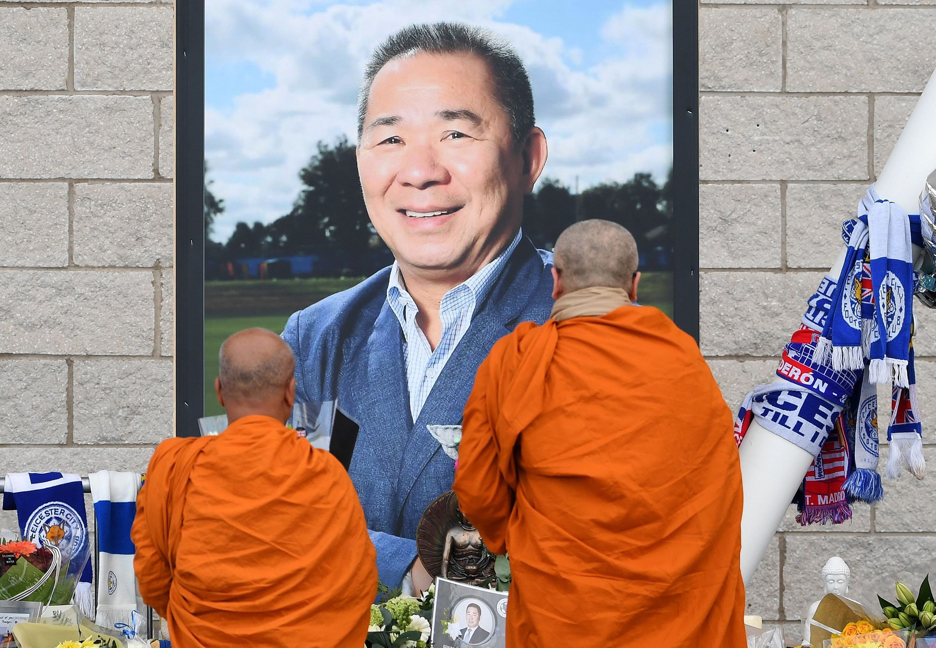 Buddhist monks lay tributes by a photograph of Leicester City’s Thai chairman Vichai Srivaddhanaprabha, outside the King Power Stadium. Photo: AFP
