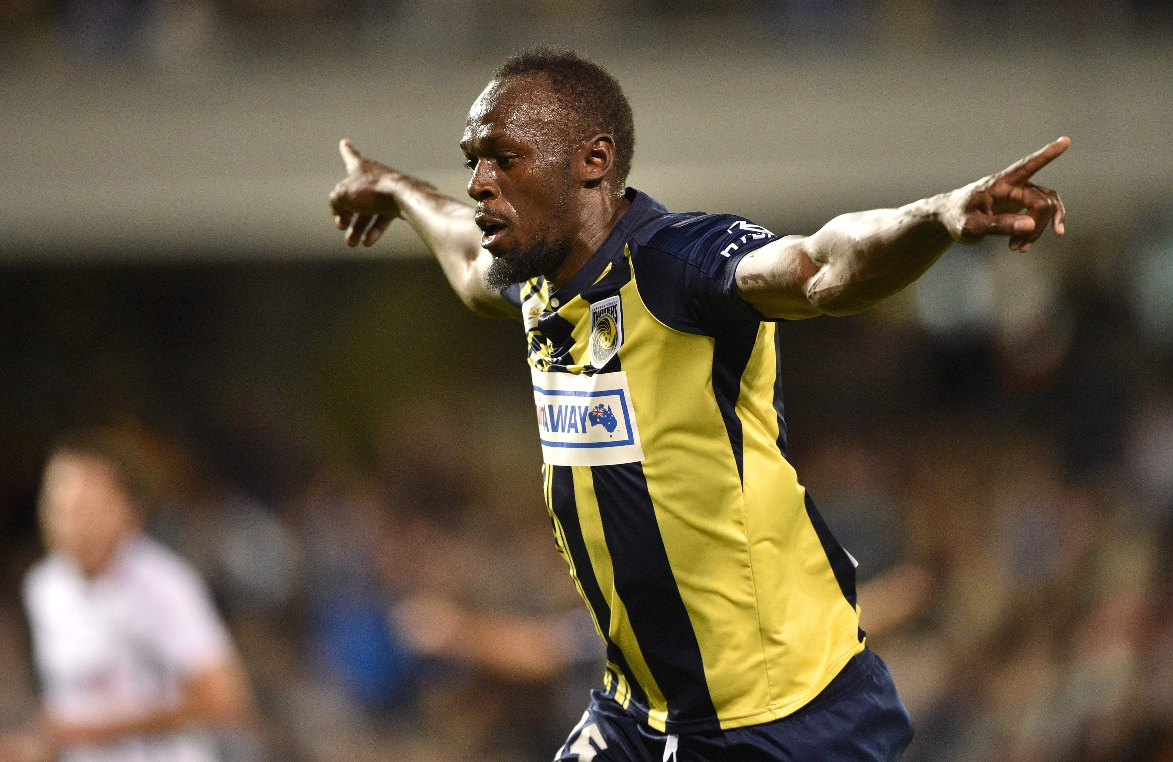 Usain Bolt celebrates scoring for A-League club Central Coast Mariners in his first competitive start against Macarthur South West United in Sydney. Photo: AFP