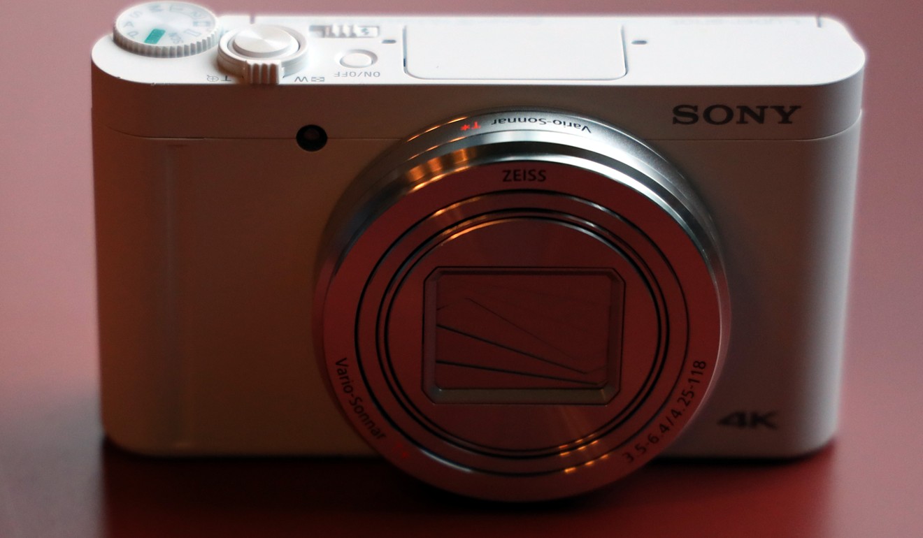 Pocket-sized Sony DSC-WX800 digital camera's zoom lens packs a big